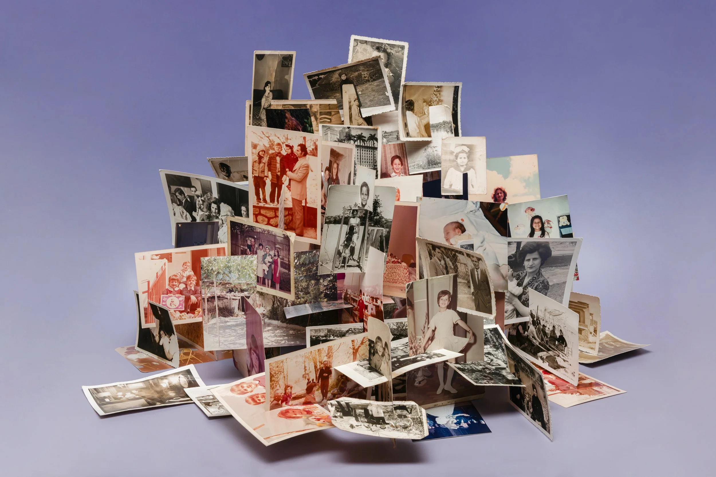Latent Memory sculpture made from found family photographs, interconnected like memories and correlations within an AI model's latent space.