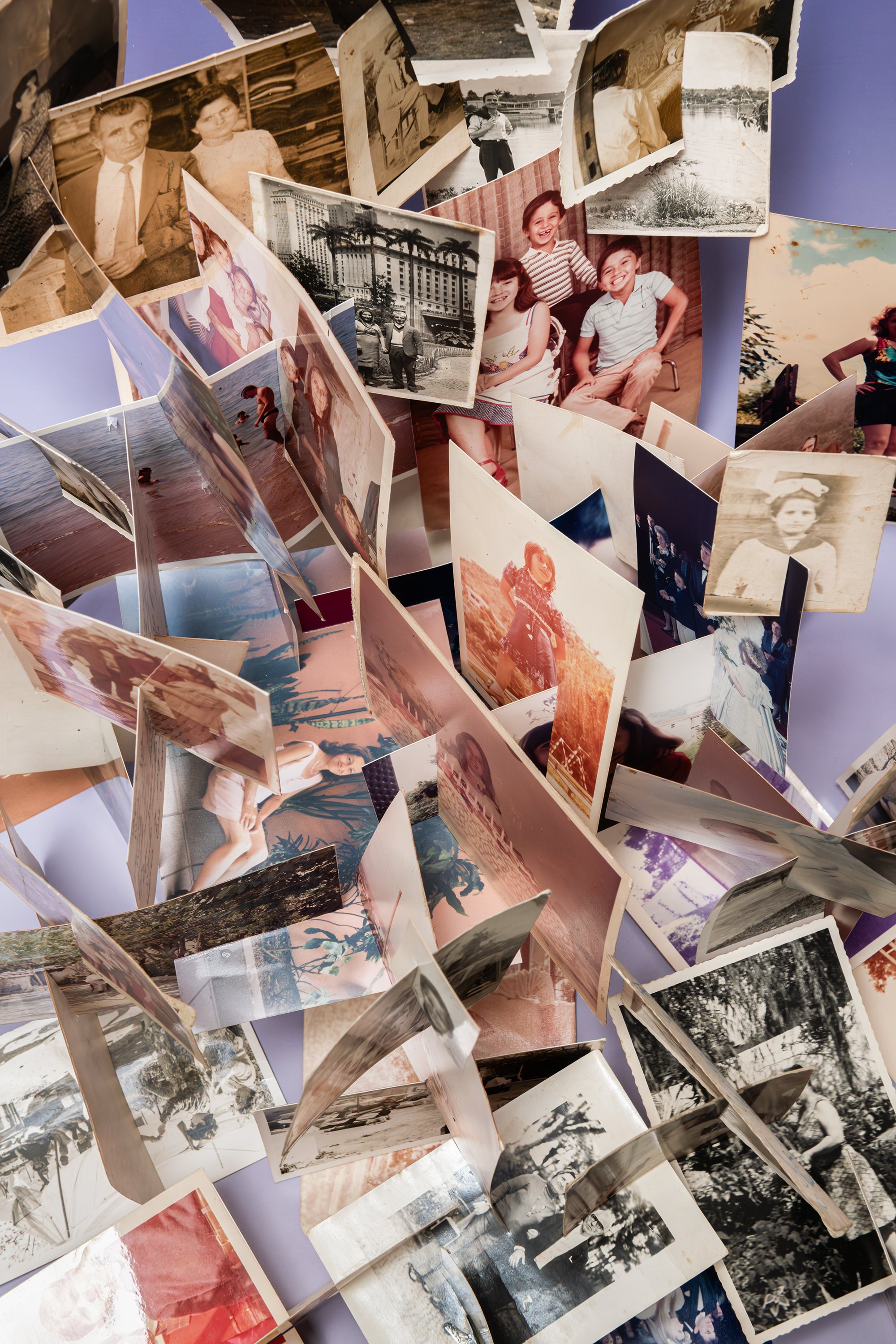 Installation view of the fragile Latent Memory structure, where fragments of a family archive form a multidimensional network of memories.