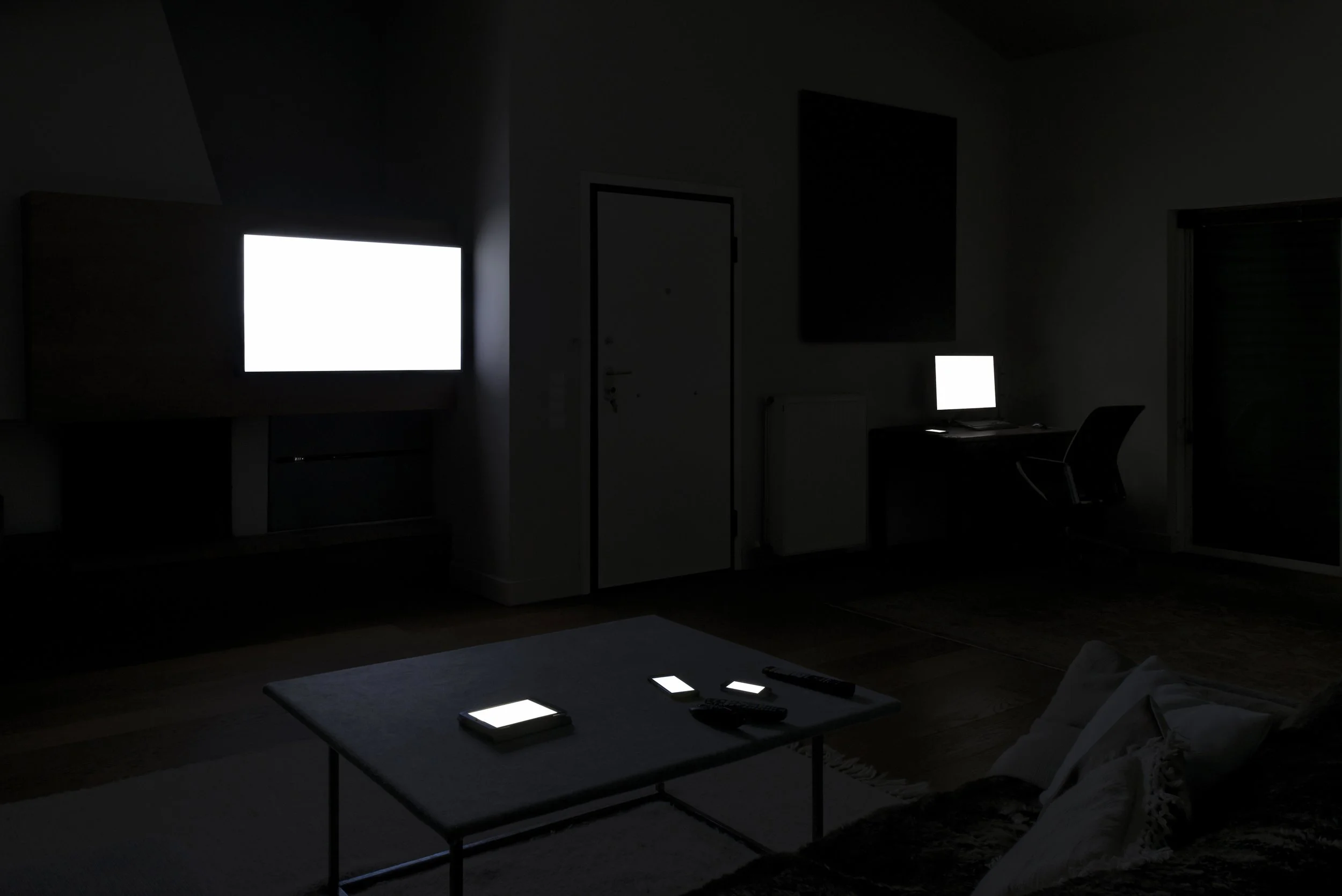 Uncle’s Visit from Family Portraits by Maria Mavropoulou, a domestic portrait in which connected devices assume family roles, reversing the relationship between technological object and human subject.