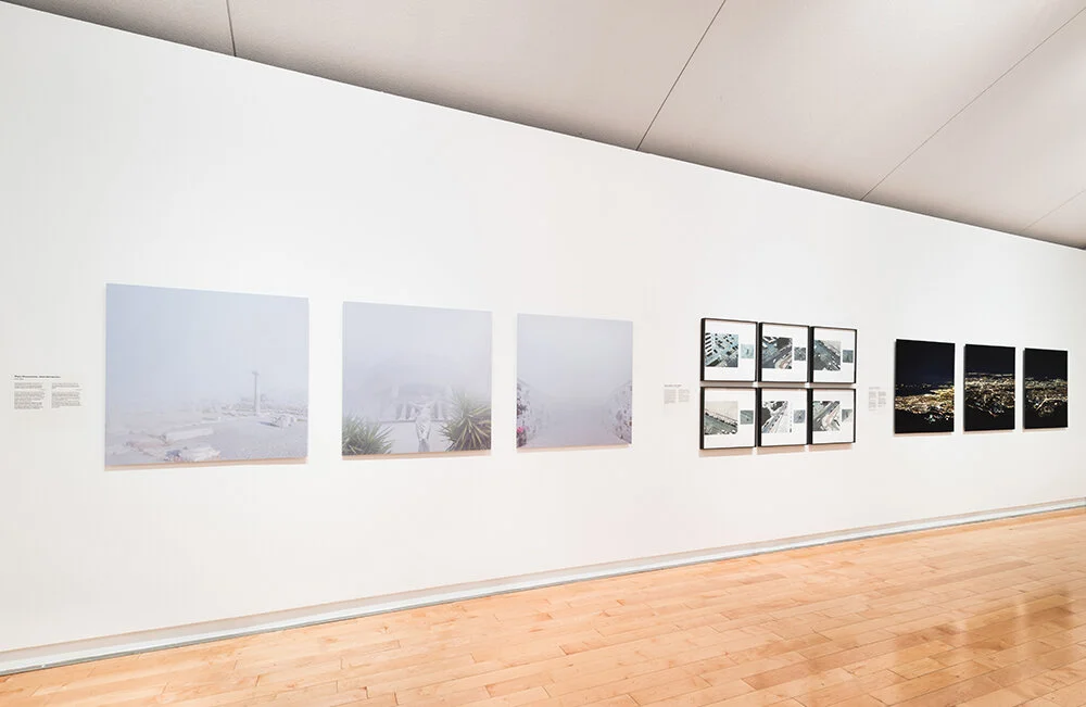 Exhibition view featuring photographs from Inner State, a series portraying Greece’s landscapes and social uncertainty during the Greek crisis of 2012–2014.