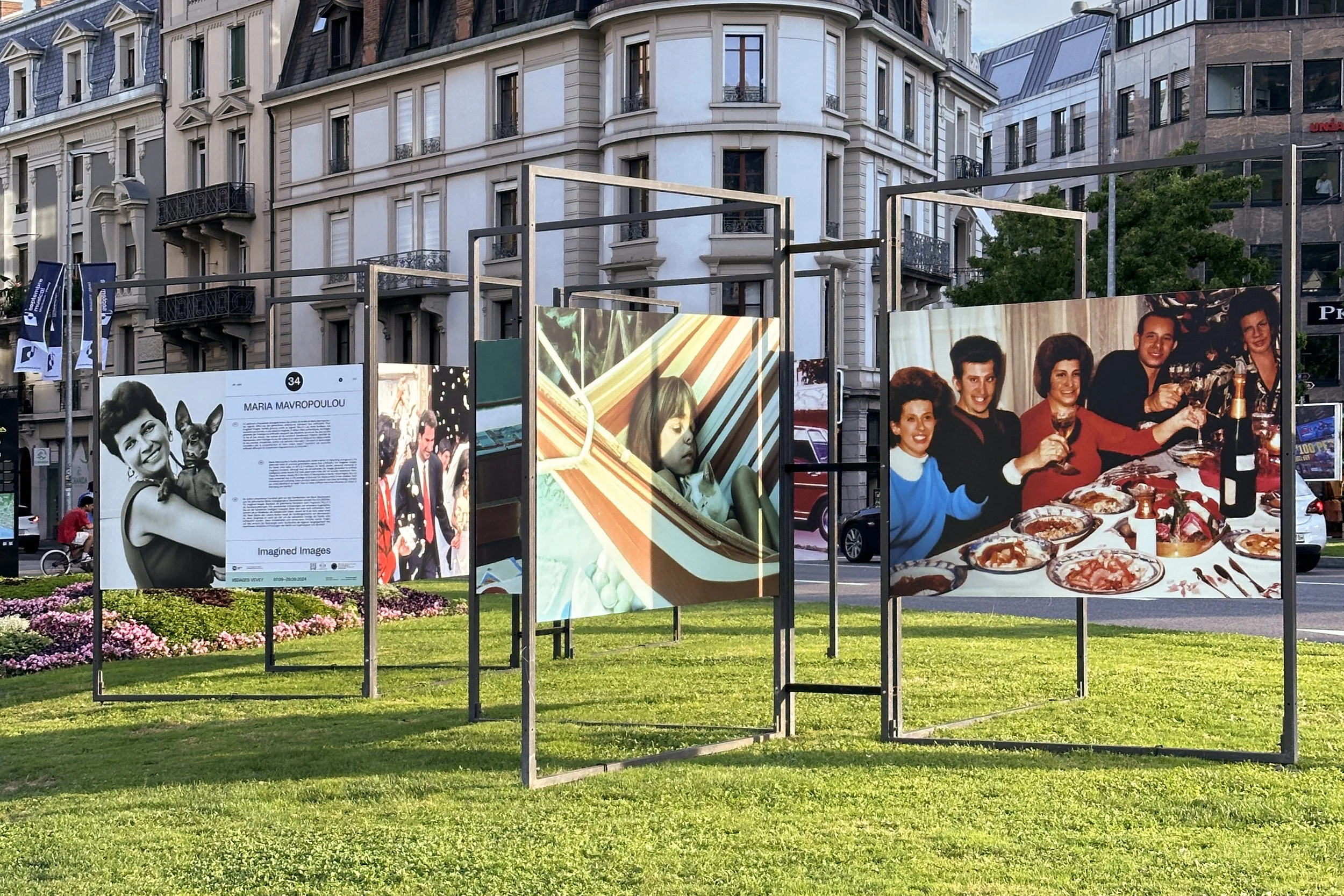 Images Vevey installation view of Imagined Images, with AI-generated family photographs arranged as fragments of a missing personal archive.