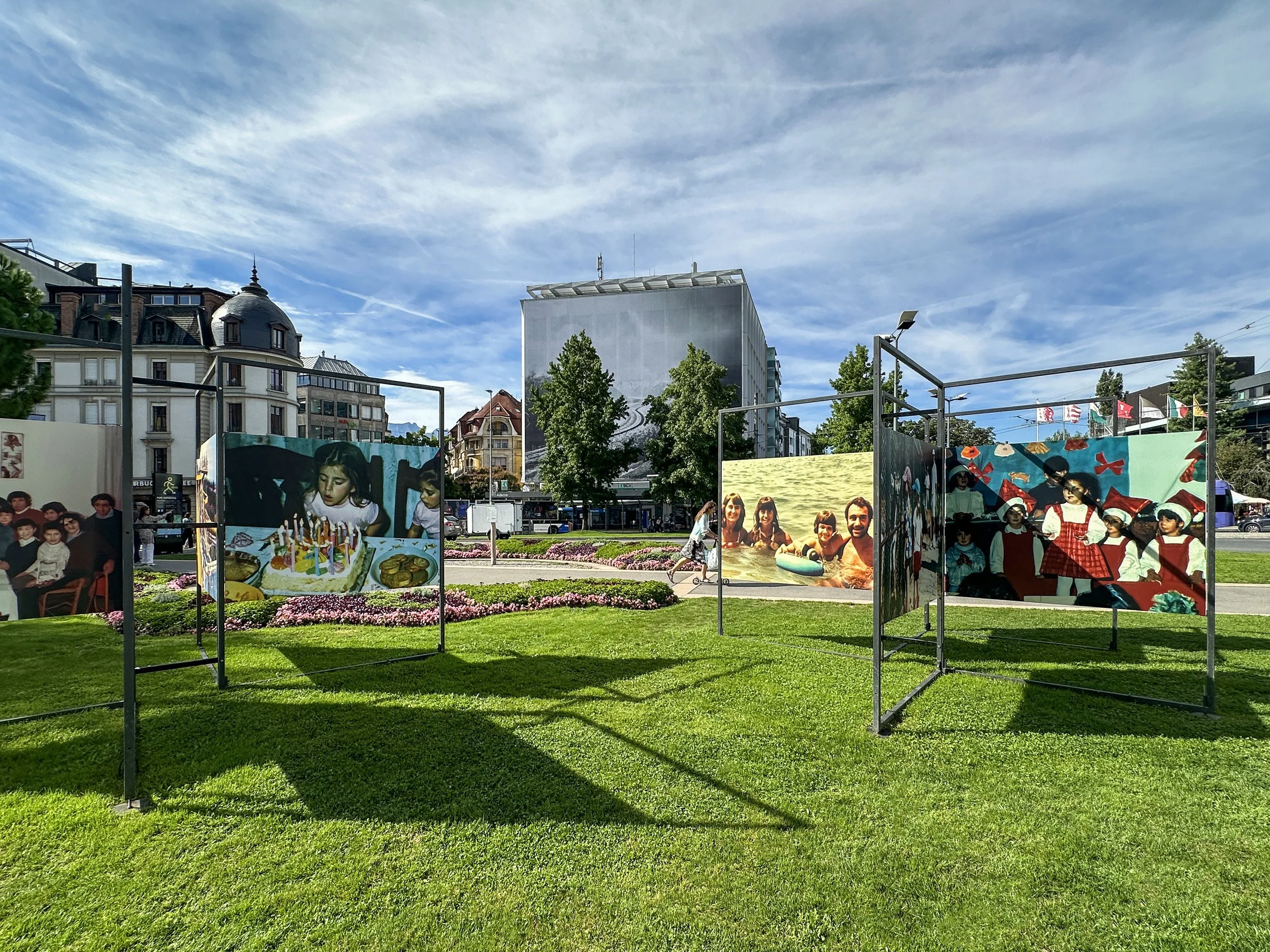Public-space view of Imagined Images at Images Vevey 2024, where DALL·E-generated photographs recreate moments absent from a family album.