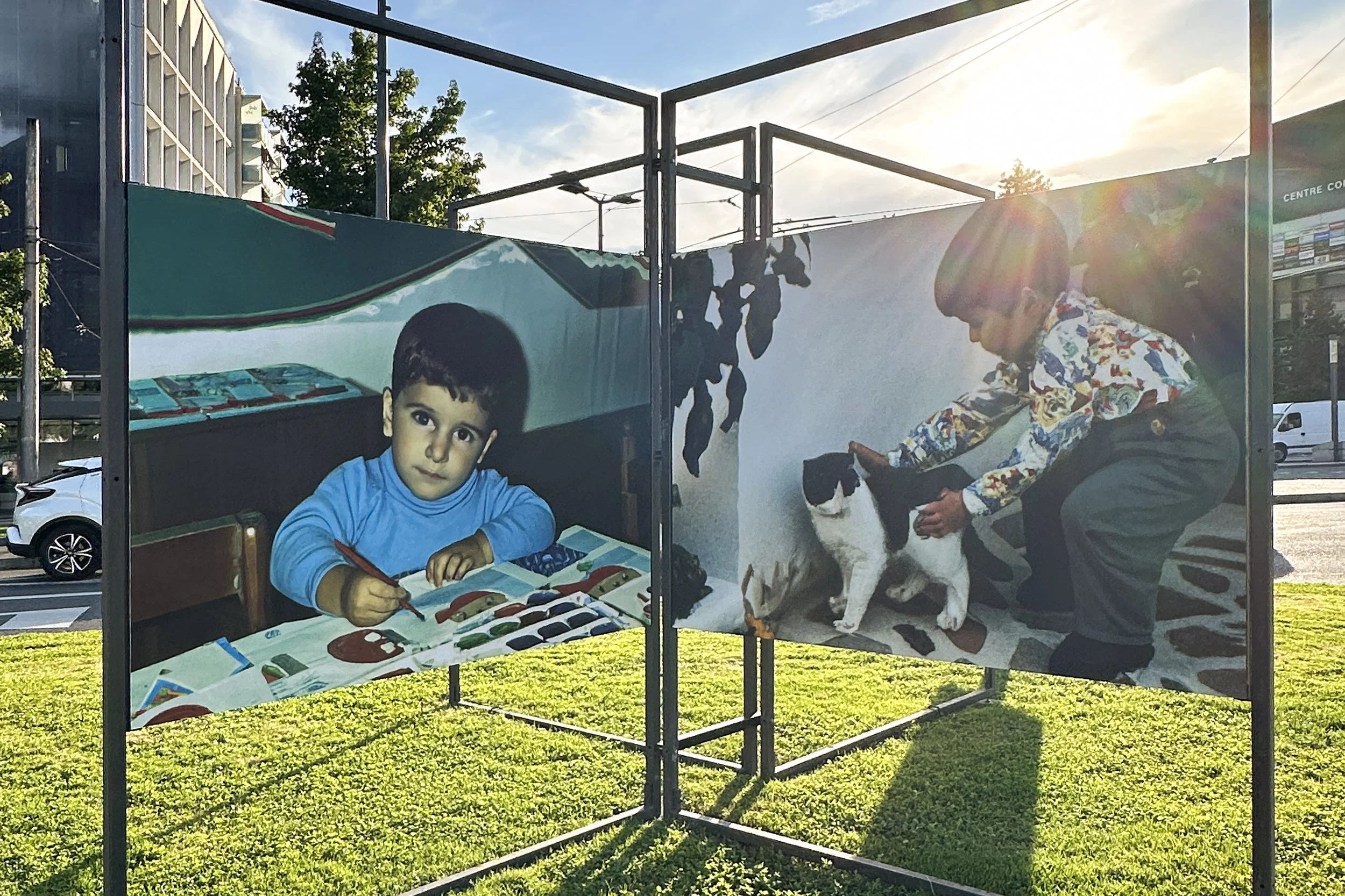 Outdoor installation photograph of Imagined Images at Images Vevey 2024, showing synthetic family memories displayed in public space.