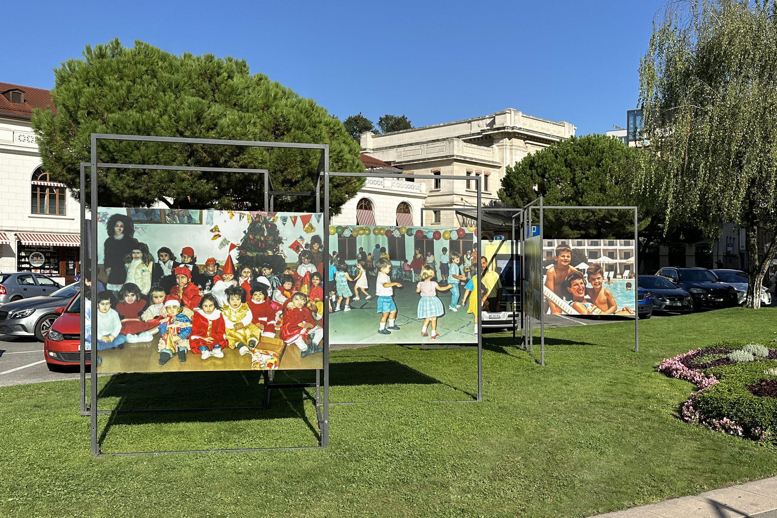 View through the Images Vevey installation of Imagined Images, with reconstructed family scenes distributed across an open metal framework.