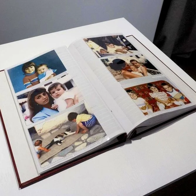 Installation view of Imagined Images at Familiar Frontiers, SVA New York in 2024, presenting AI-generated photographs as a reconstructed family archive.