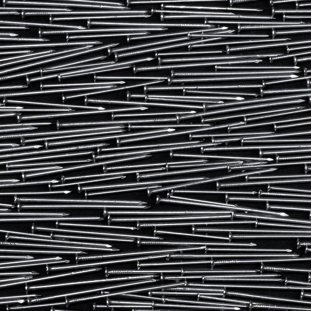 Detail of Geometry of Chaos #3, revealing patterns that emerge from a seemingly random arrangement of cold metallic units.