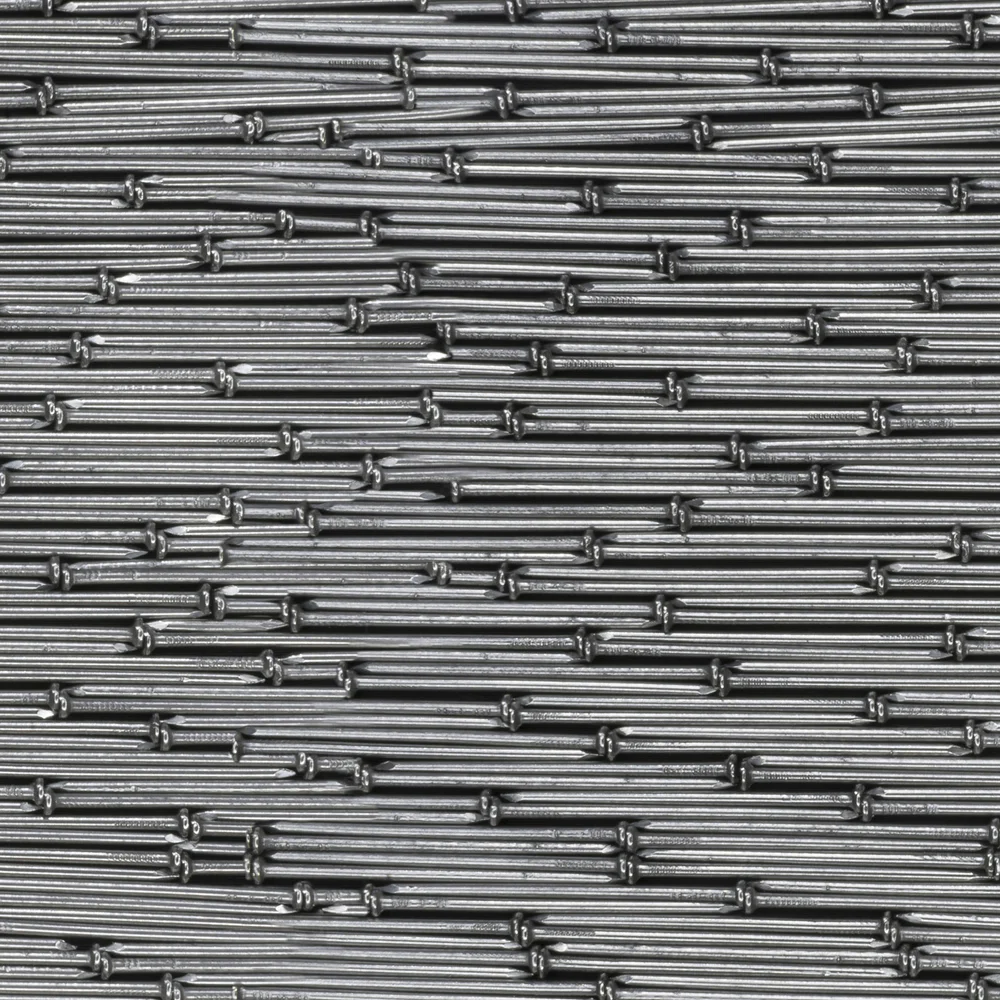 Detail of Geometry of Chaos #10, emphasizing self-organization and the patterns emerging within a chaotic accumulation of nails.