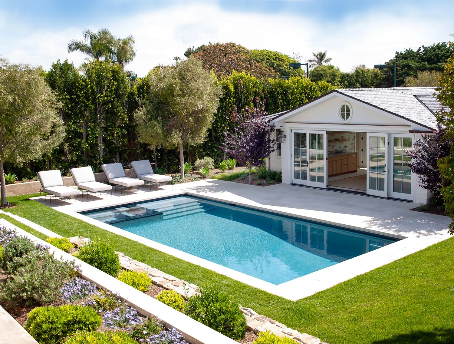 Pool and pool house welcome family and friends.