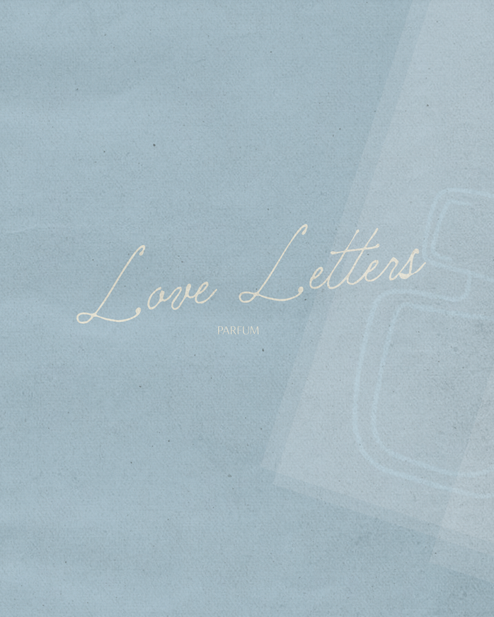 Light blue background with the text 'Love Letters' in cursive font and 'Parfum' underneath, suggesting a perfume packaging design.