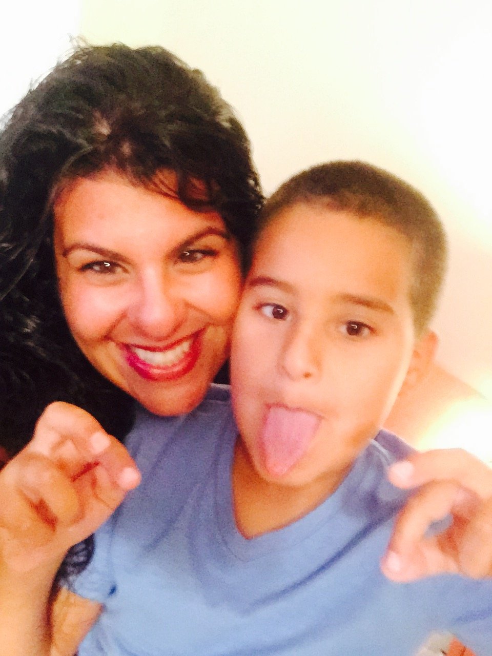 Julie and kid Nick funny face big smile.JPG