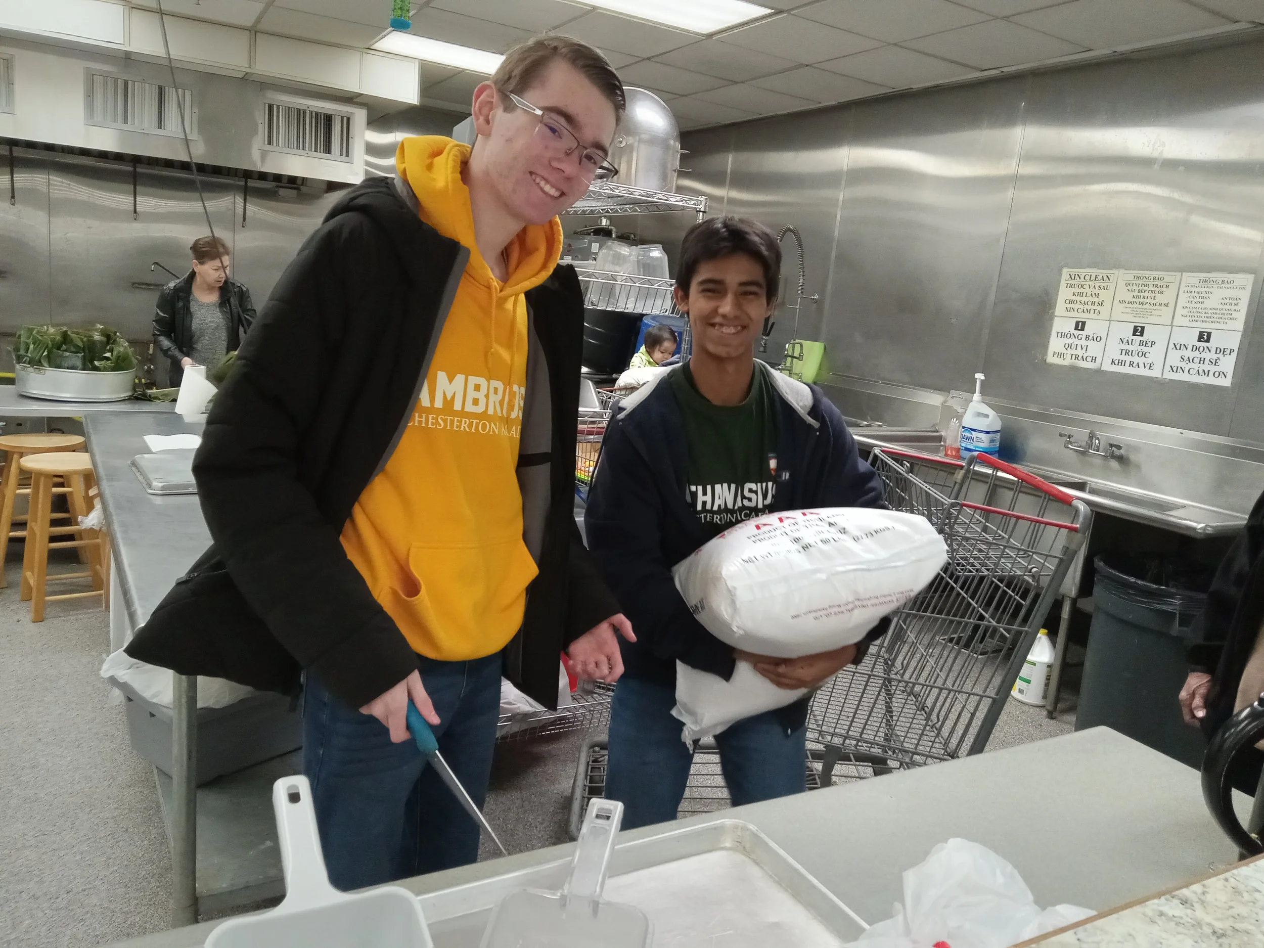 Two CASM students volunteering