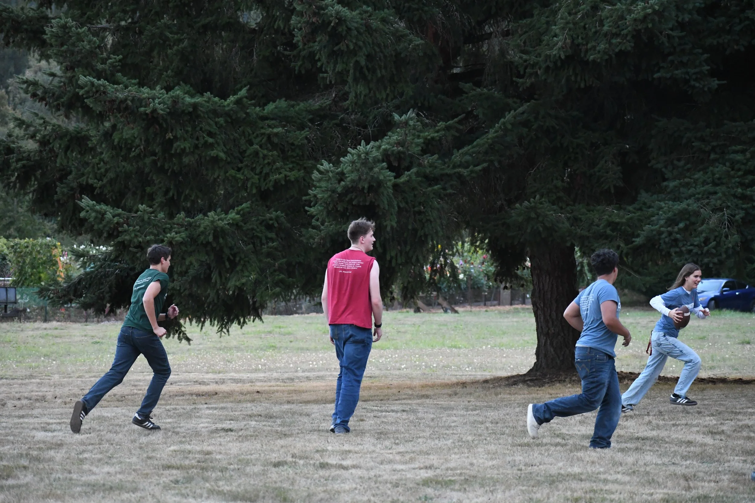 Students playing football at Michaelmas celebration