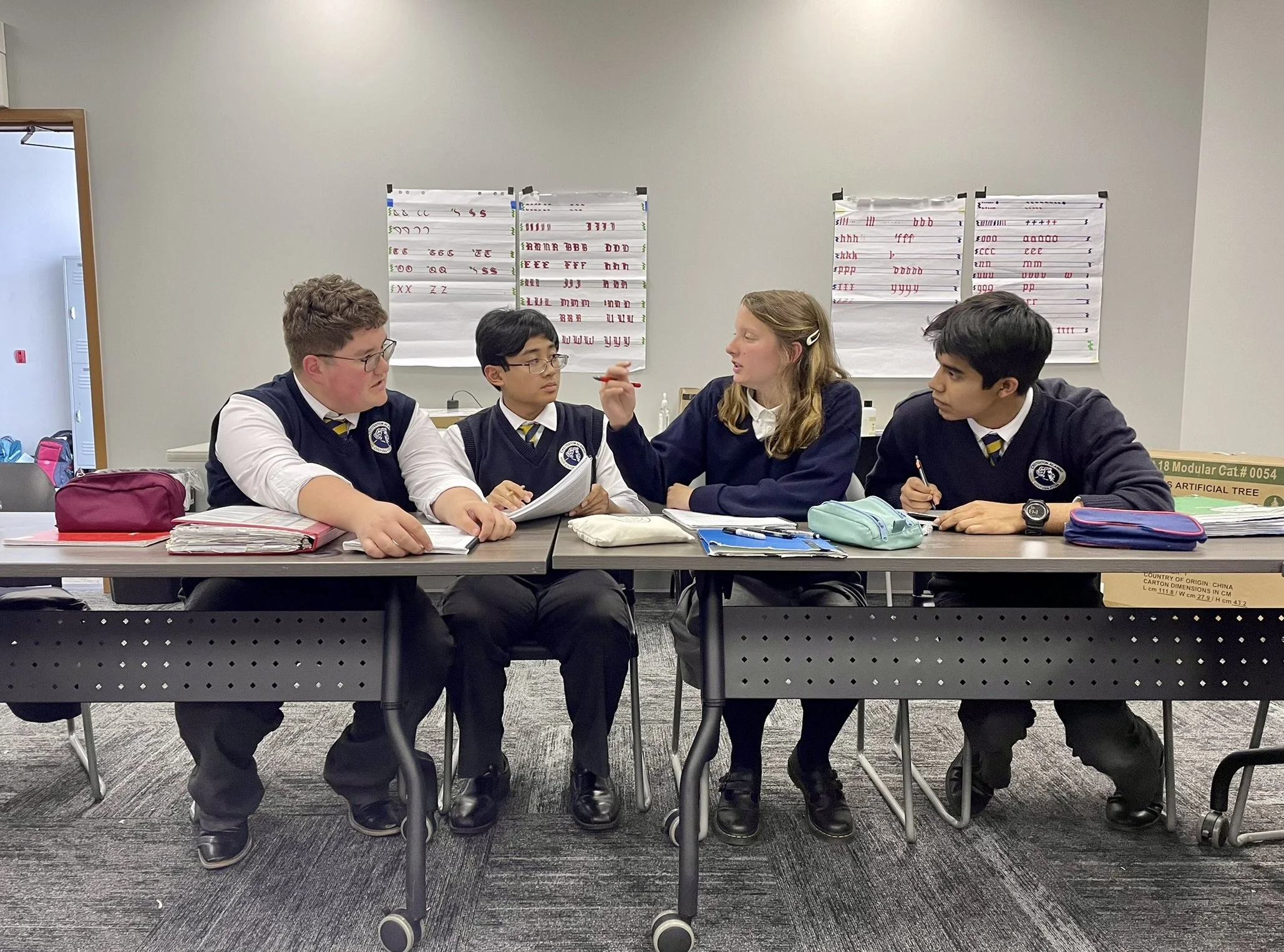 Group of students debating a topic