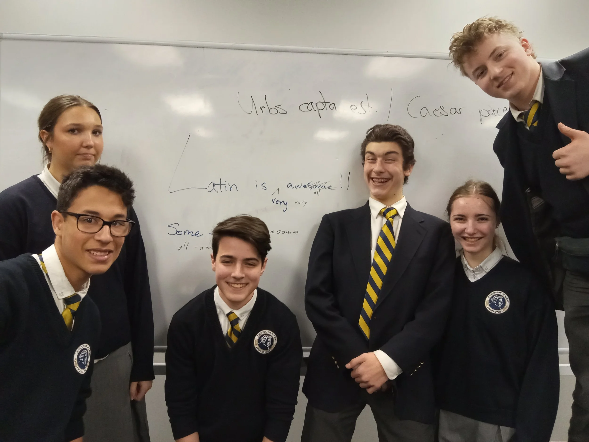 CASM students stop to pose for a picture in Latin class