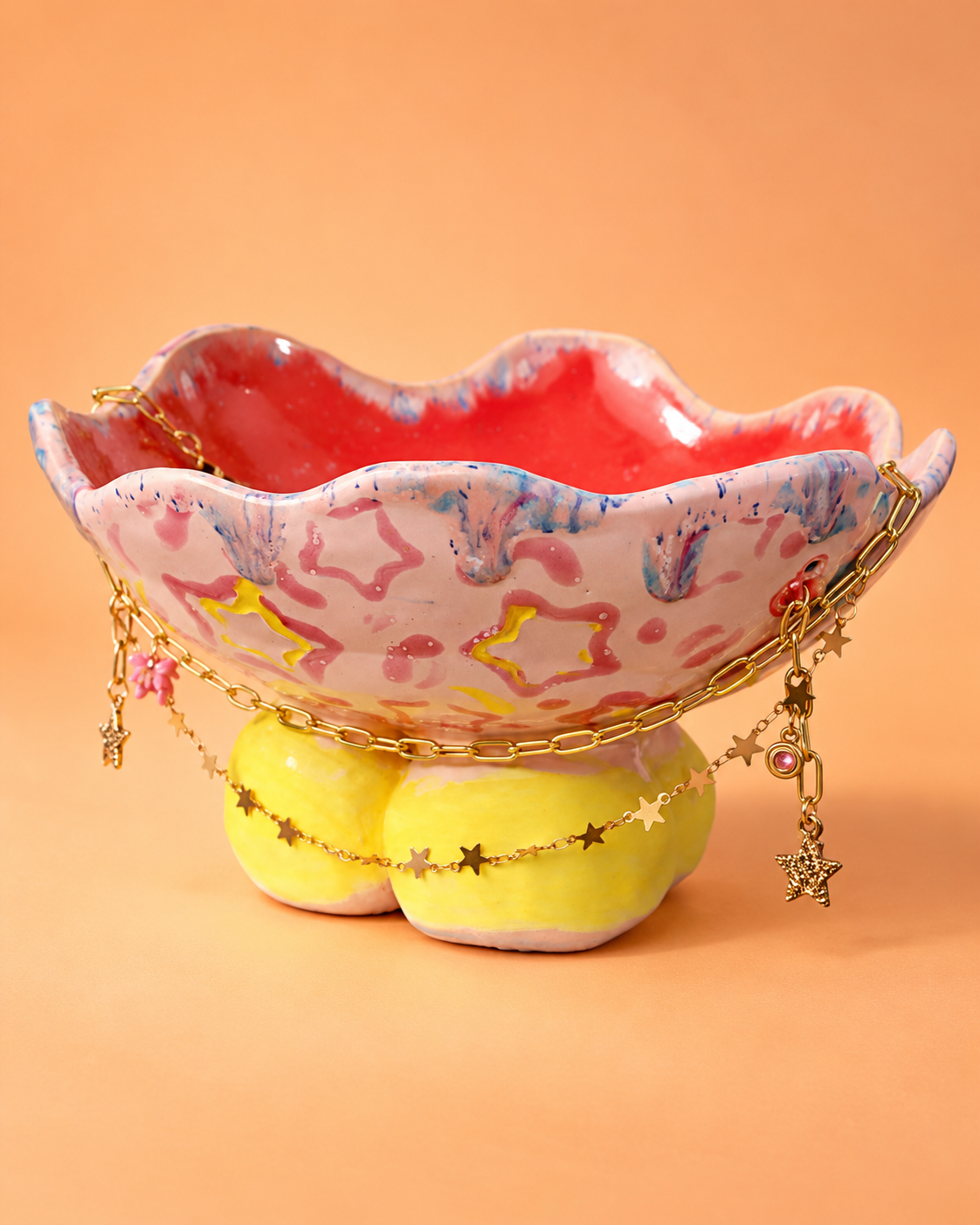 Whimsical Jewel-Draped Ceramic Bowl.png