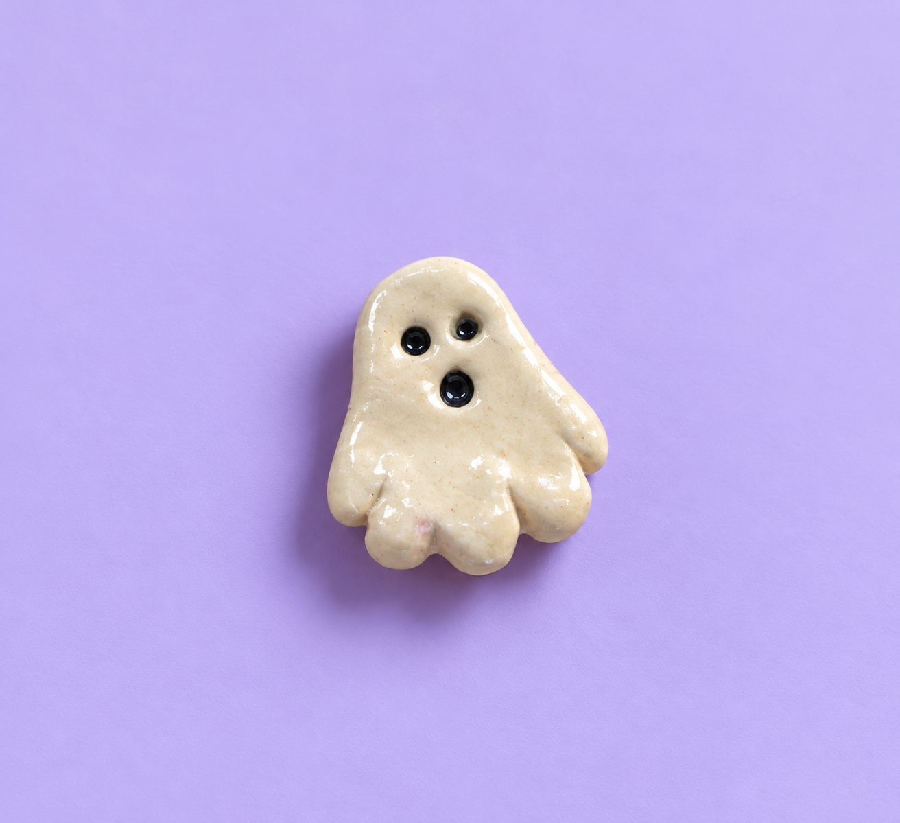 Glossy Ceramic Ghost on Lavender.png