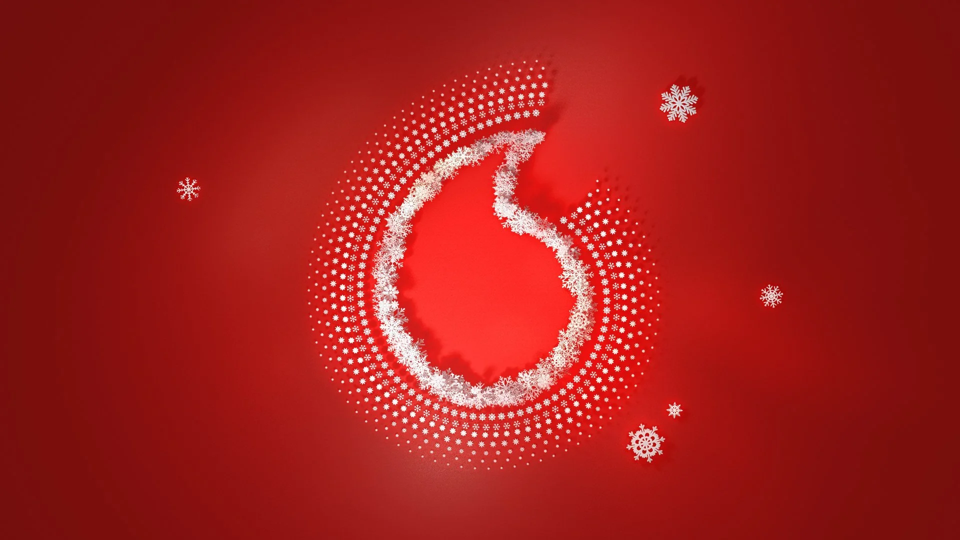 Red background with a stylized white number six made up of snowflakes, surrounded by snowflakes of various sizes.