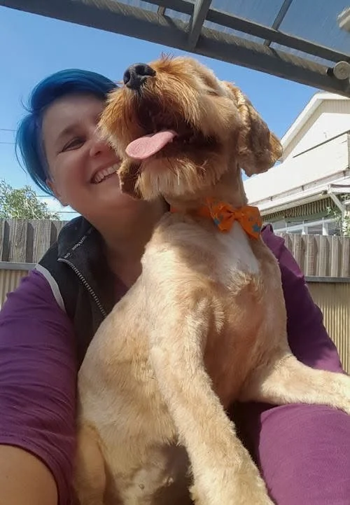 Steph Hall, founder of Yes! Canine Care, working with a dog