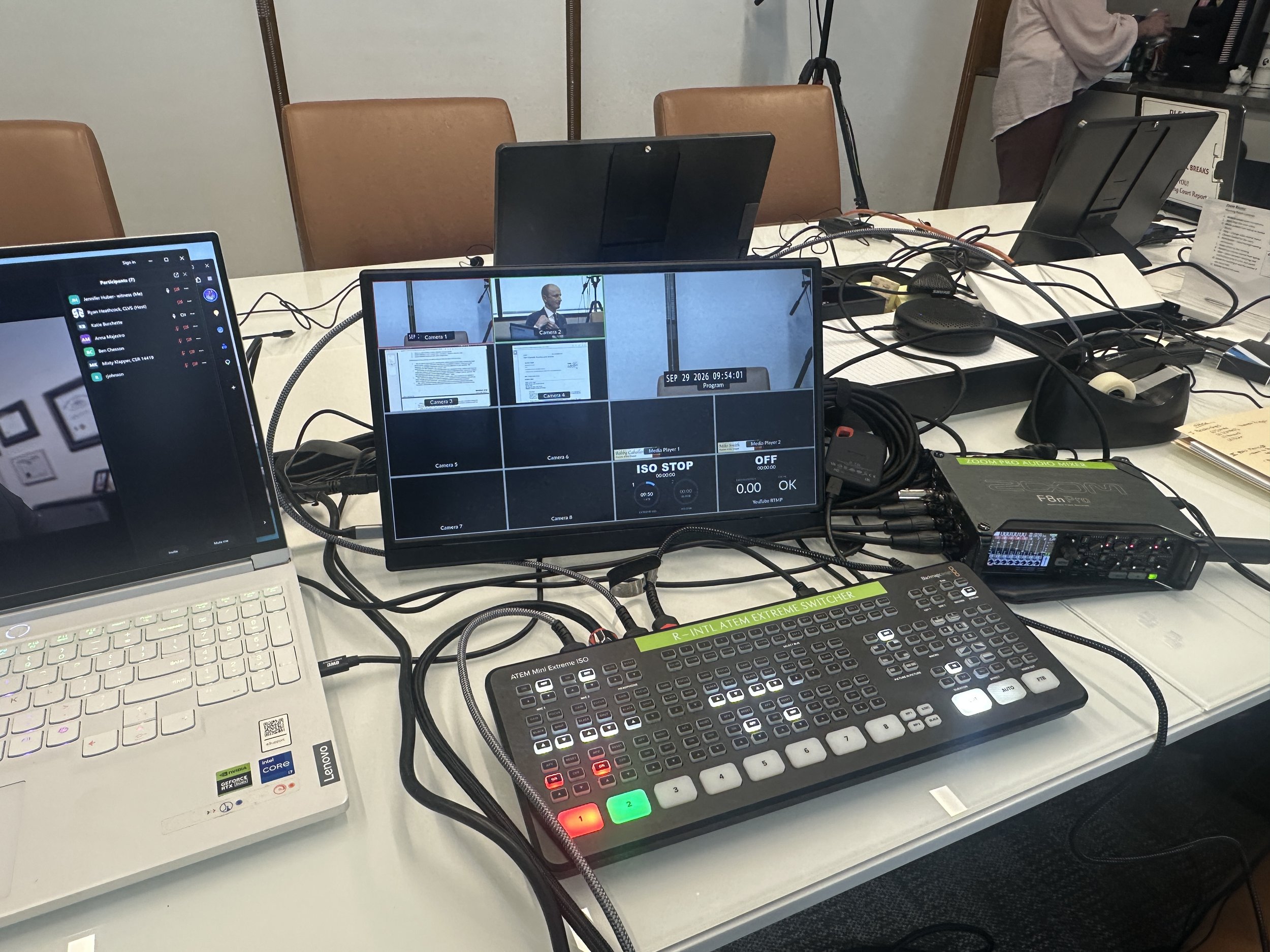 The switcher, monitor and laptop for ZOOM as well as the audio mixer to ensure professional quality audio.