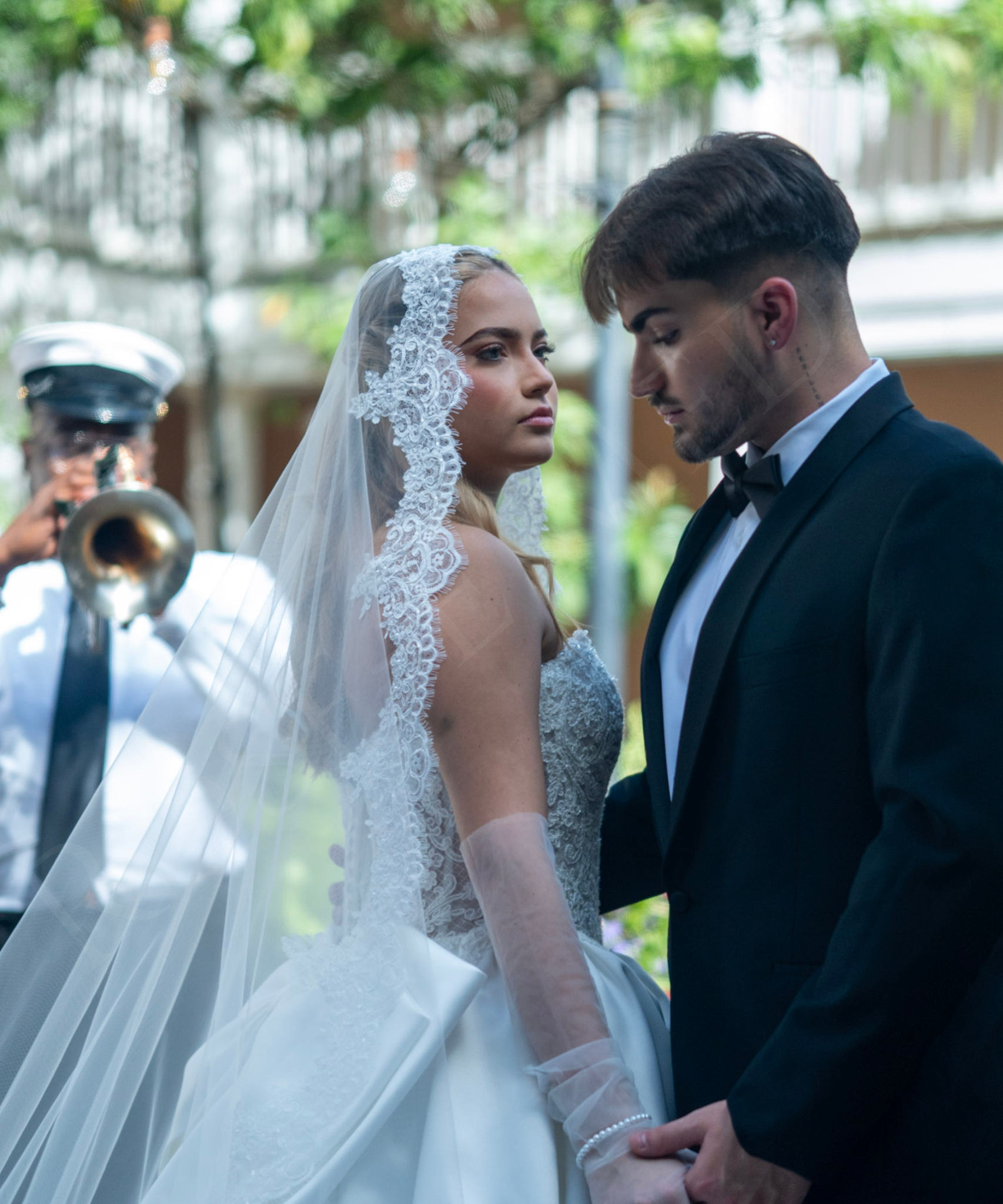Models looking at each other during a NOW Weddings editorial shoot at the Malaga Inn in Mobile, Alabama.