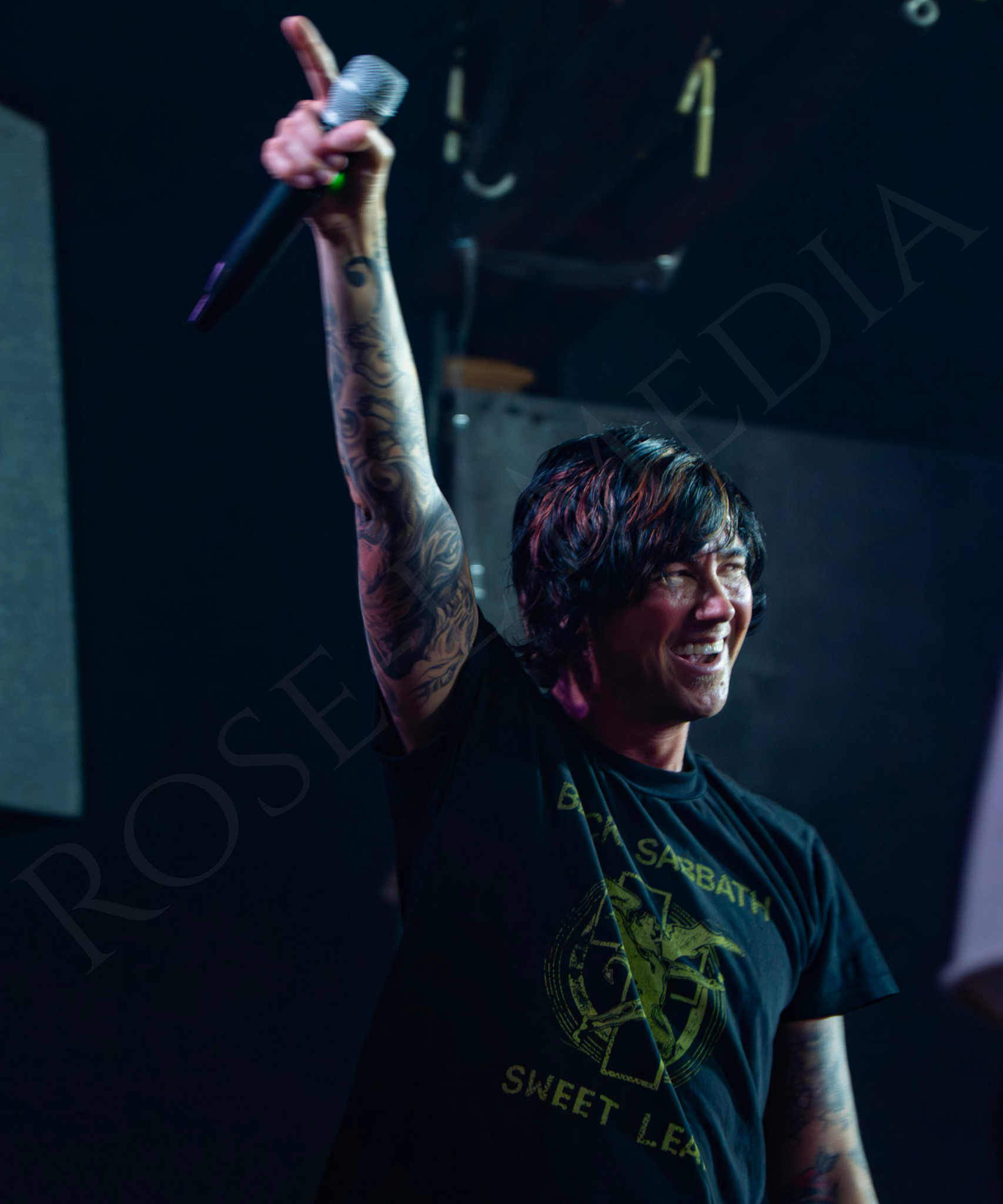 Kellin Quinn at Bemo Rouge’s Emo Night in New Orleans, captured in a live performance moment filled with stage energy, movement, and the atmosphere of the crowd.