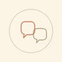 Two speech bubbles, one red and one green, inside a circle.