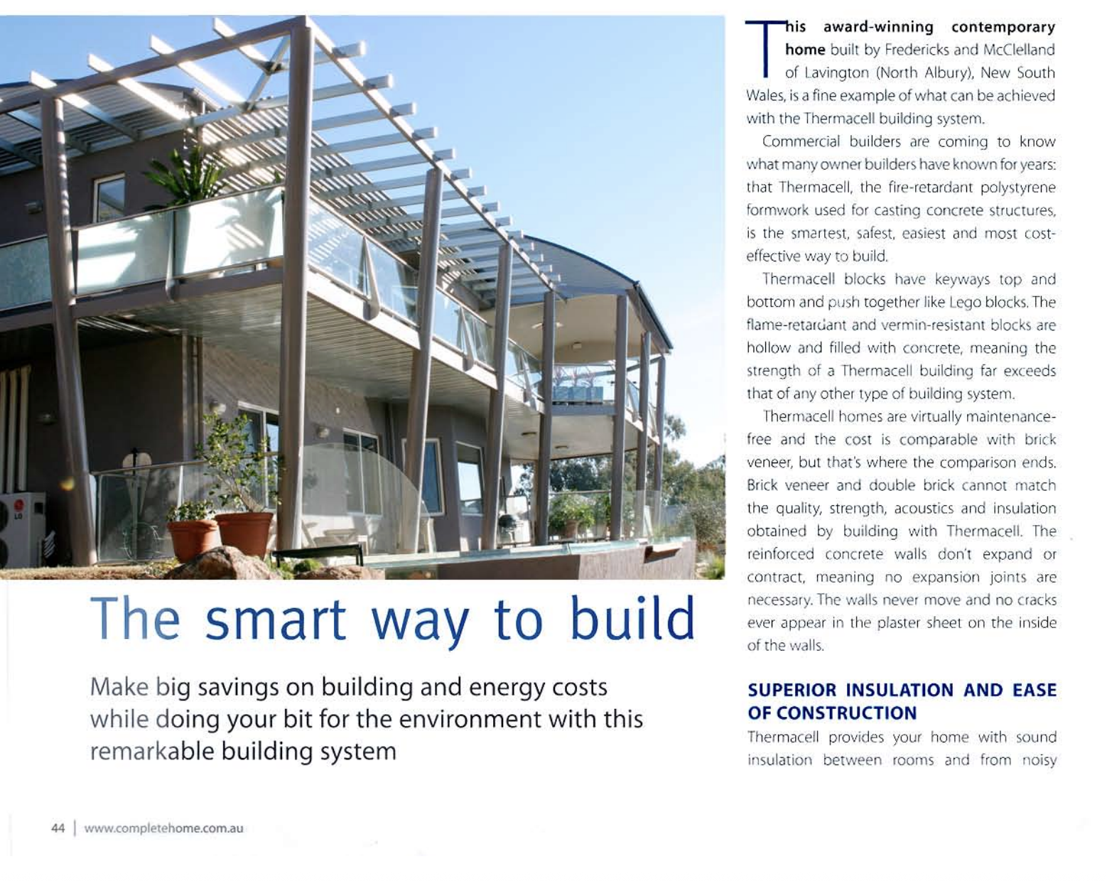 A page from a brochure or magazine featuring a modern, multi-story house with a unique architectural design, including large glass panels, white structural beams, and an outdoor balcony with glass railings. The text discusses fire-retardant building materials and insulation systems.