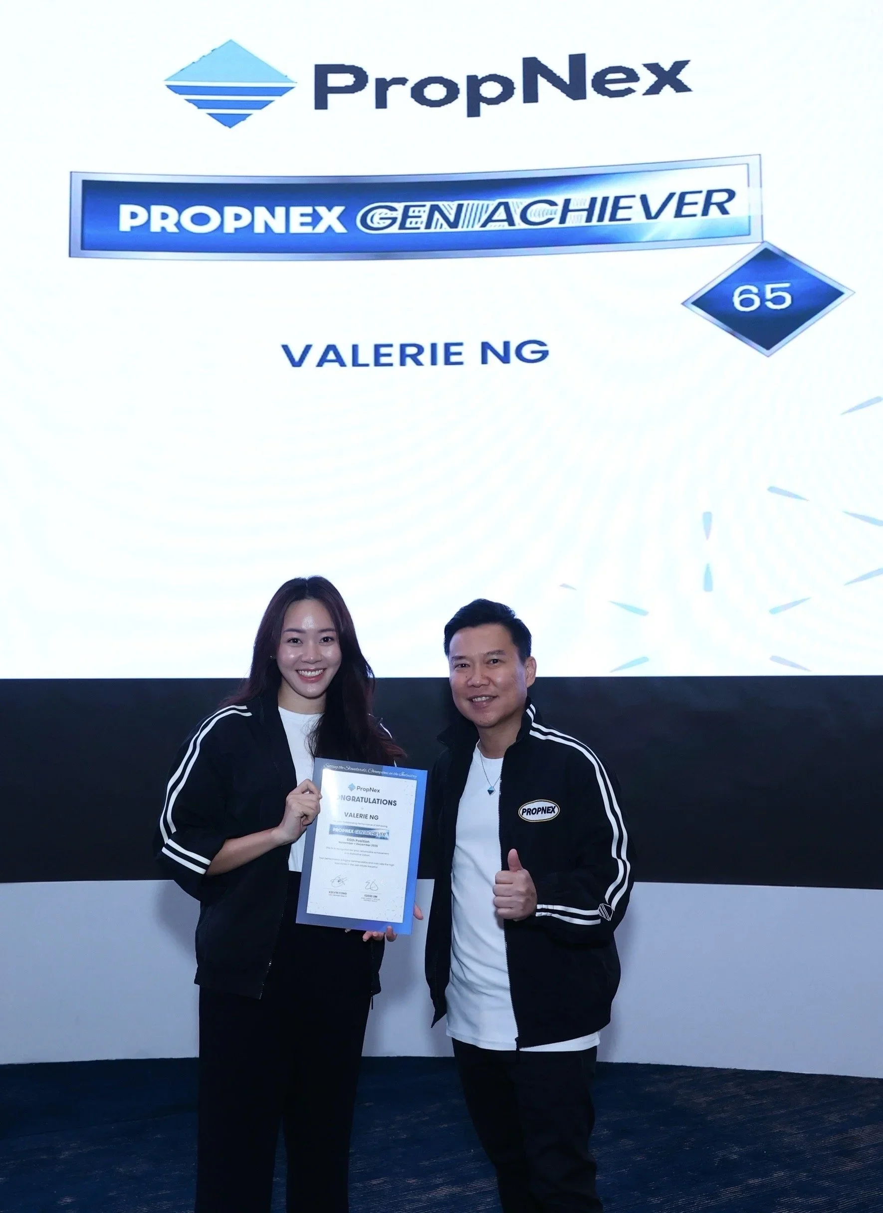 Valerie Ng receiving a Gen Achiever award