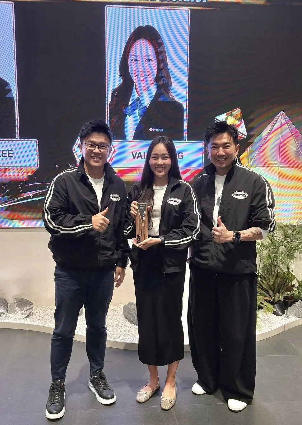 Valerie Ng on stage at an agent awards event