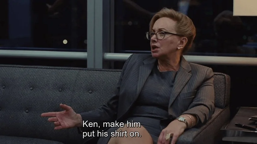 An image from the TV show Succession. It reads "Ken, make him put his shirt on."