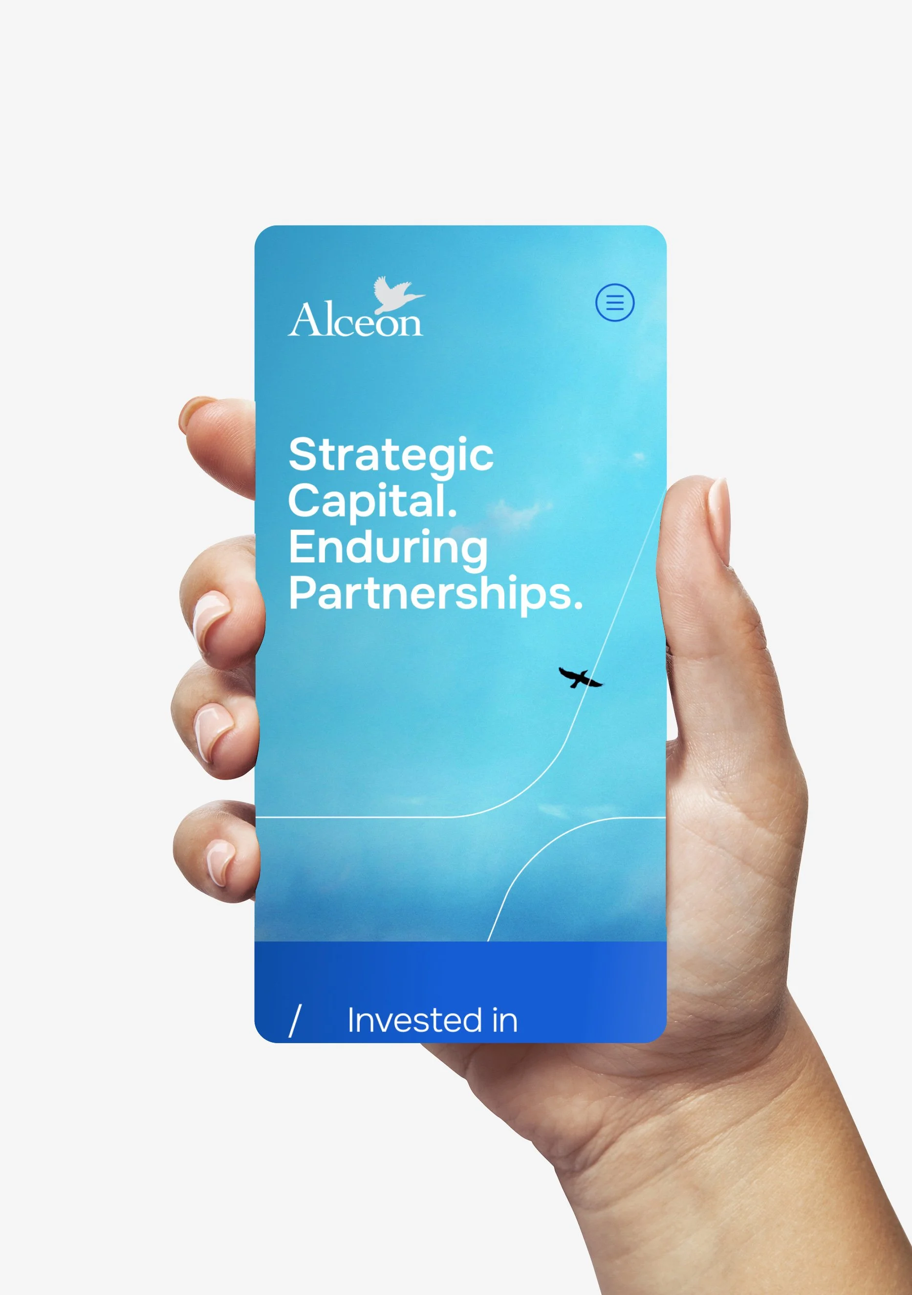 Close-up photograph of a hand holding a blue business card with the words 'Strategic Capital. Enduring Partnerships.' and a white dove logo, against a plain white background.