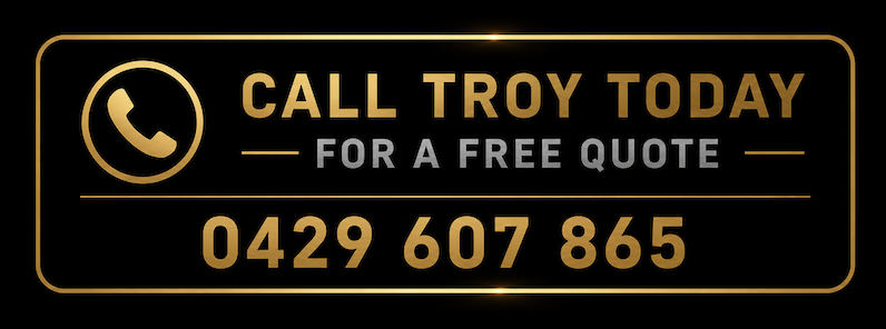 Black and gold advertisement with a phone icon, encouraging viewers to call Troy today for a free quote, featuring the phone number 0429 607 865.
