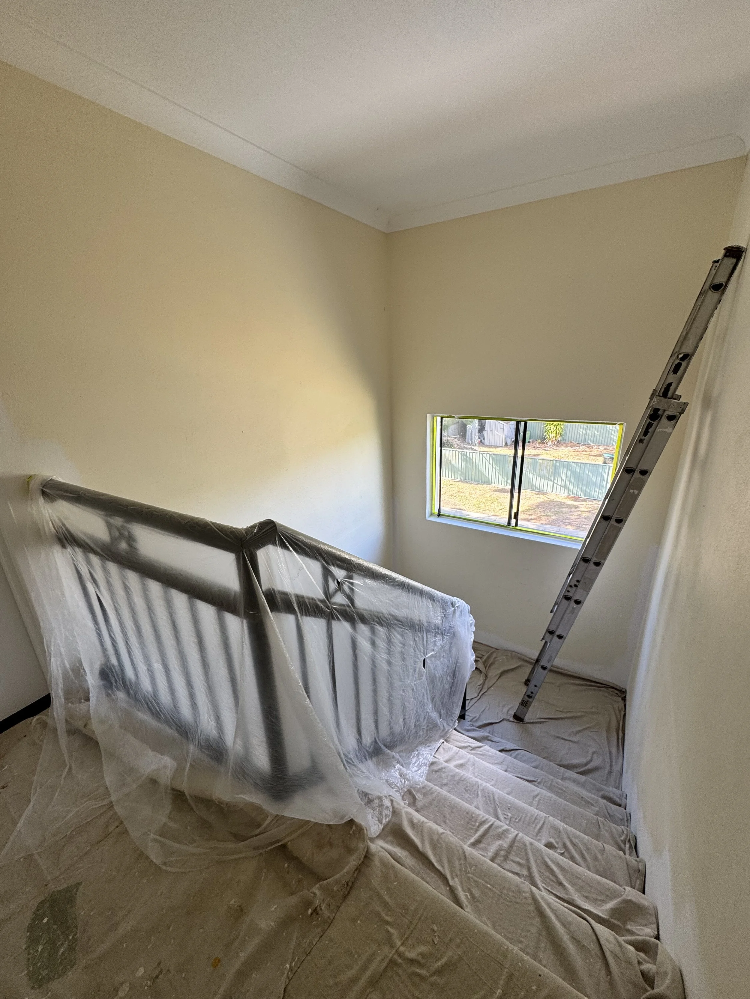 Labrador stairwell before painting.jpeg