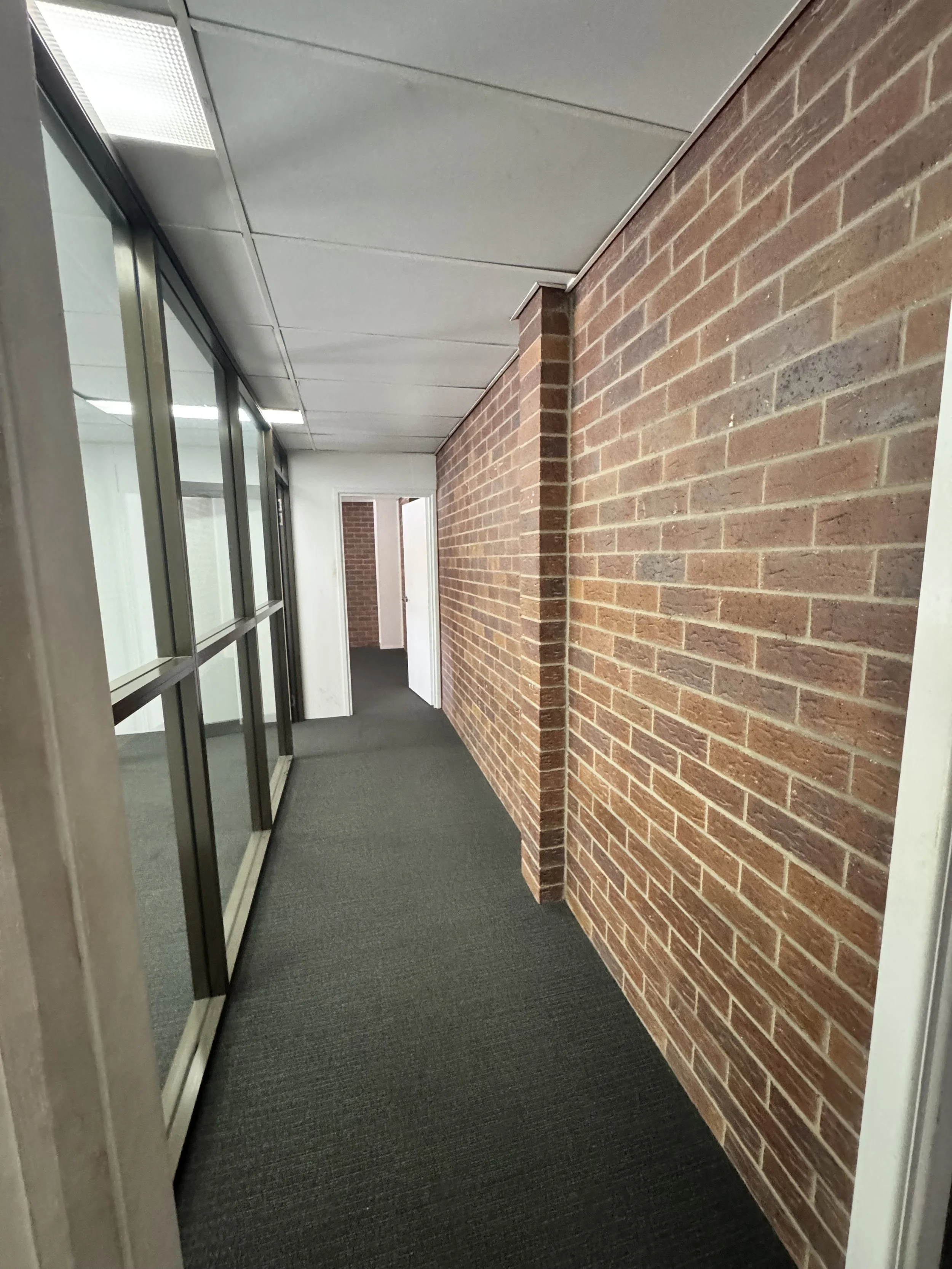 Commercial office hallway in Bethania before painting