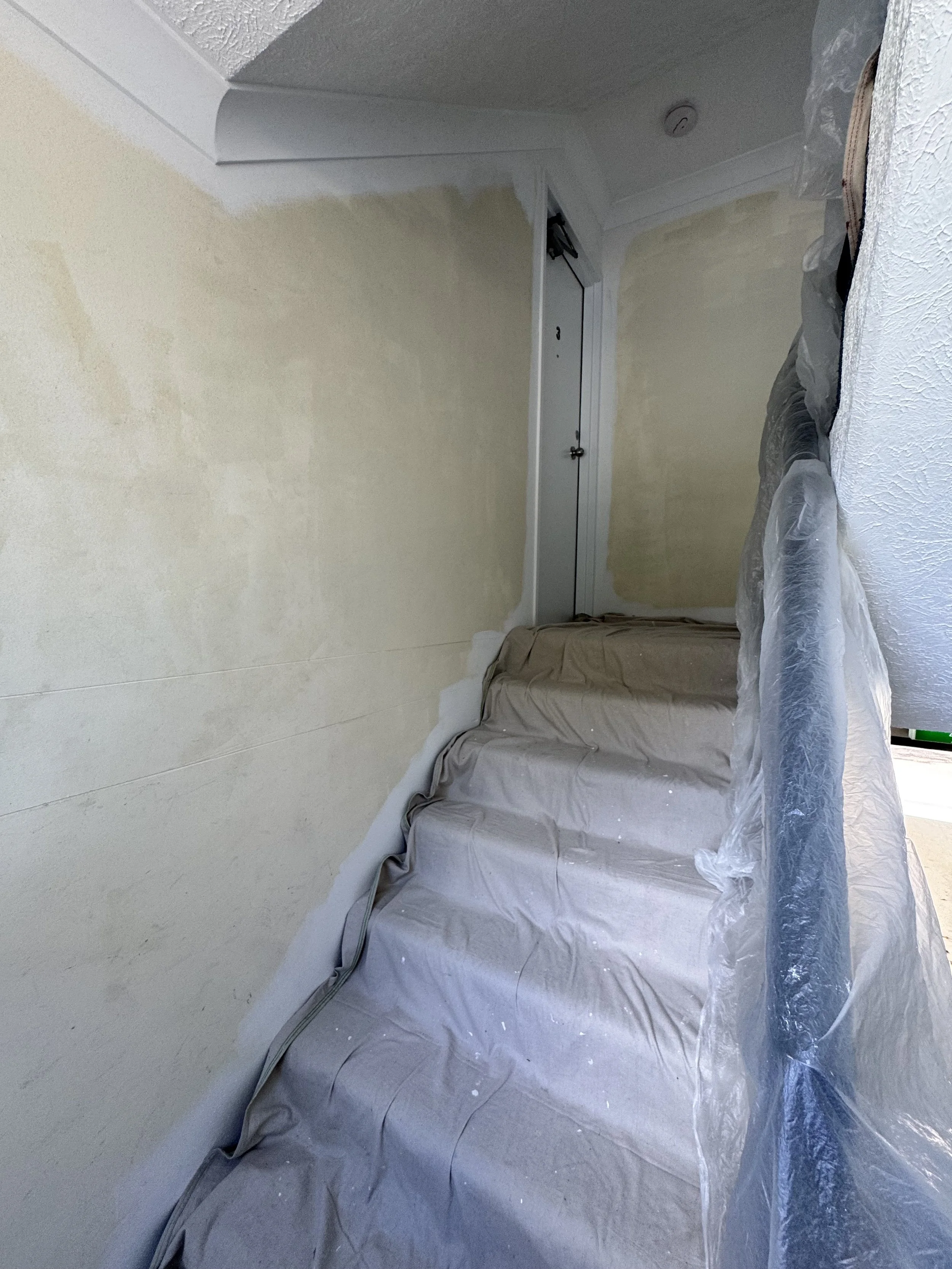 Labrador stairwell after cleaning and sarting painting photo.jpeg