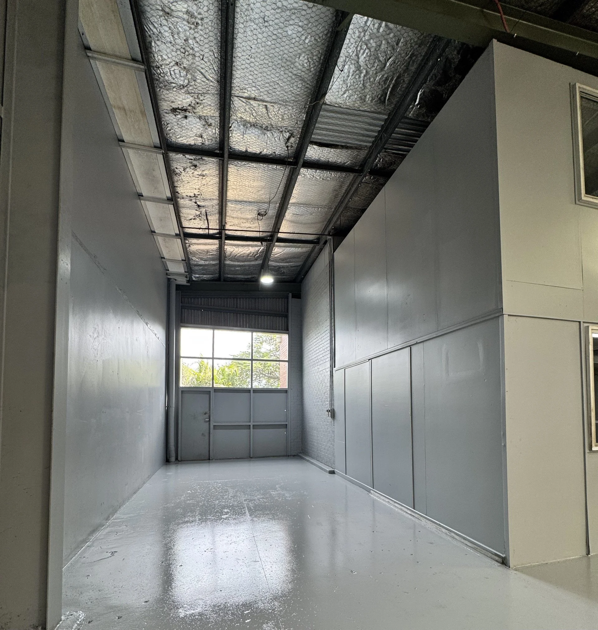 Commercial warehouse painting project in progress in Bethania