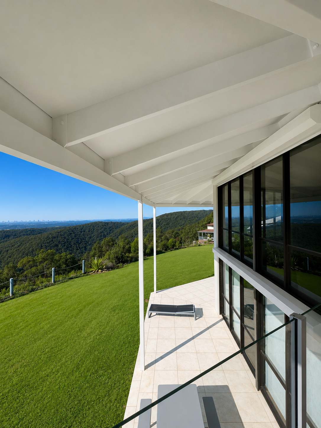 Completed exterior painting to balcony walls and covered outdoor area by CAC Coatings.
