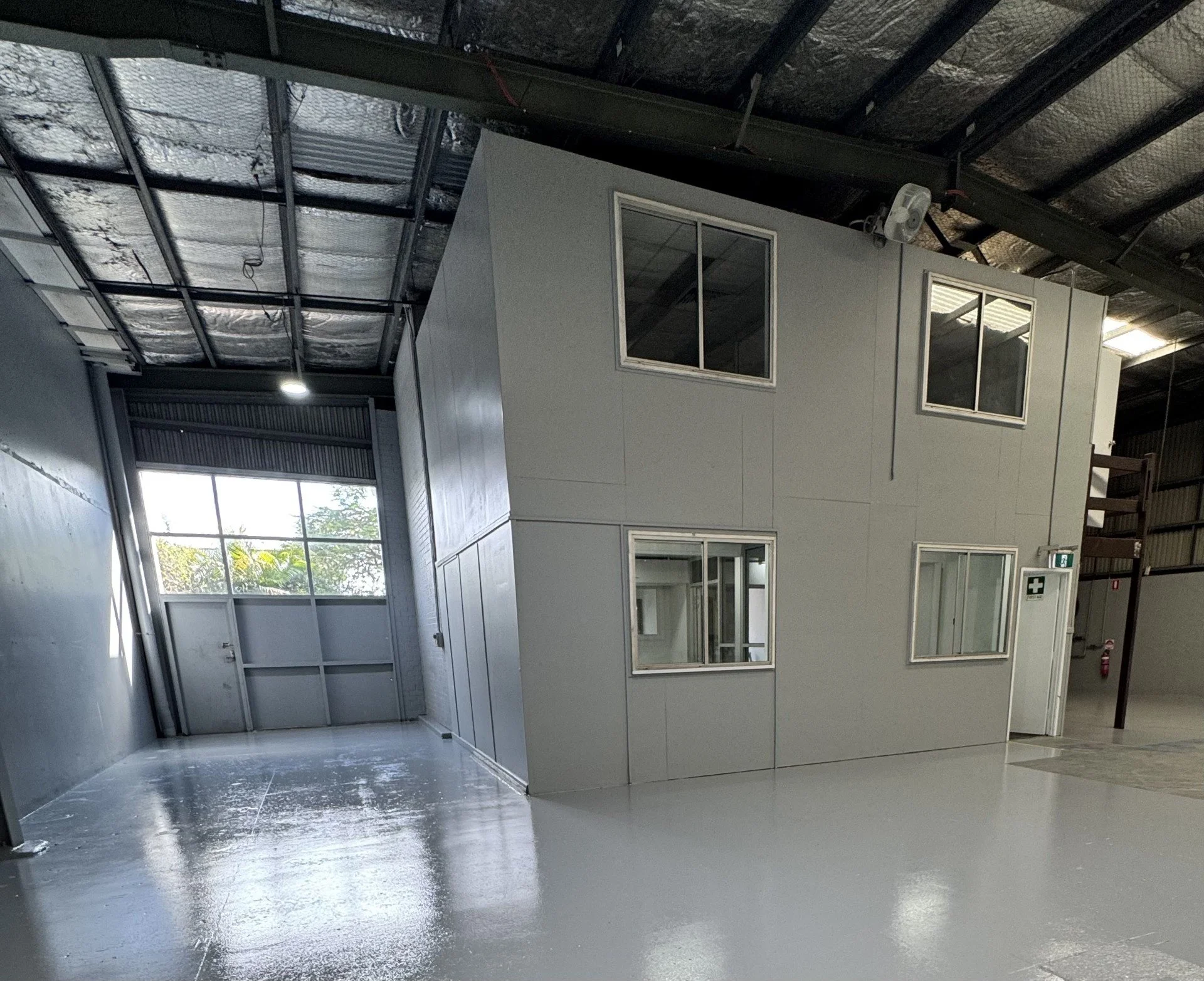 Interior of commercial warehouse after painting by CAC Coatings