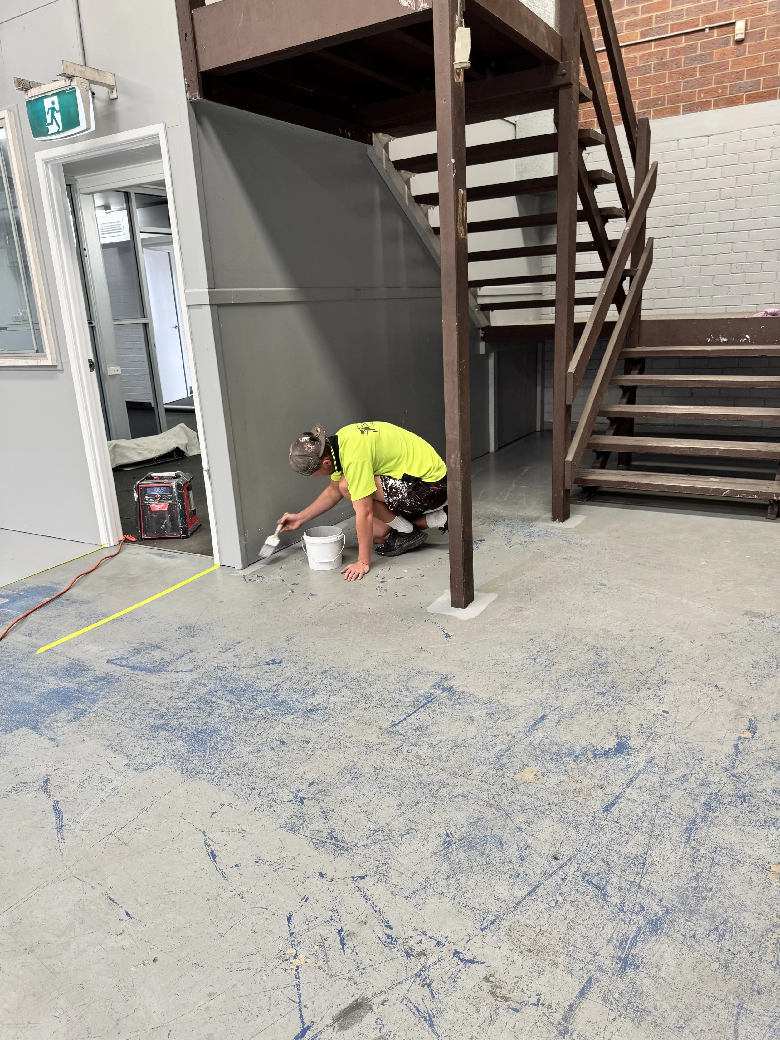 Commercial warehouse floor painting in progress in Bethania