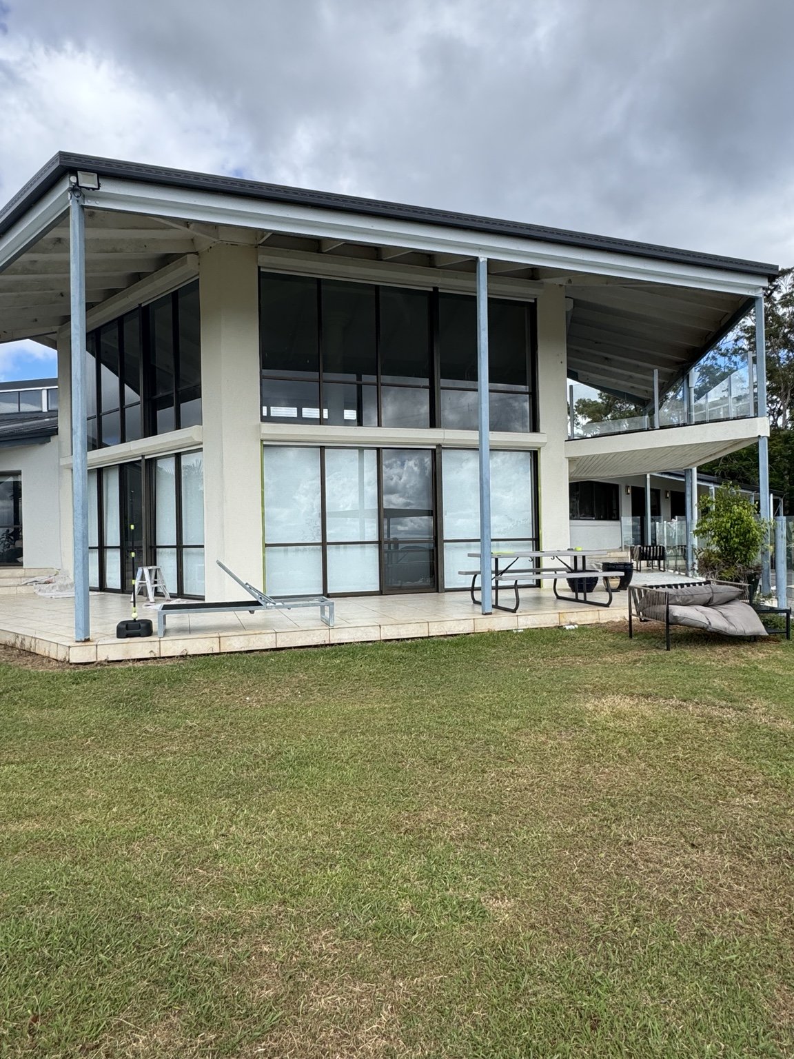 Exterior before painting of a modern two-storey home completed by CAC Coatings.