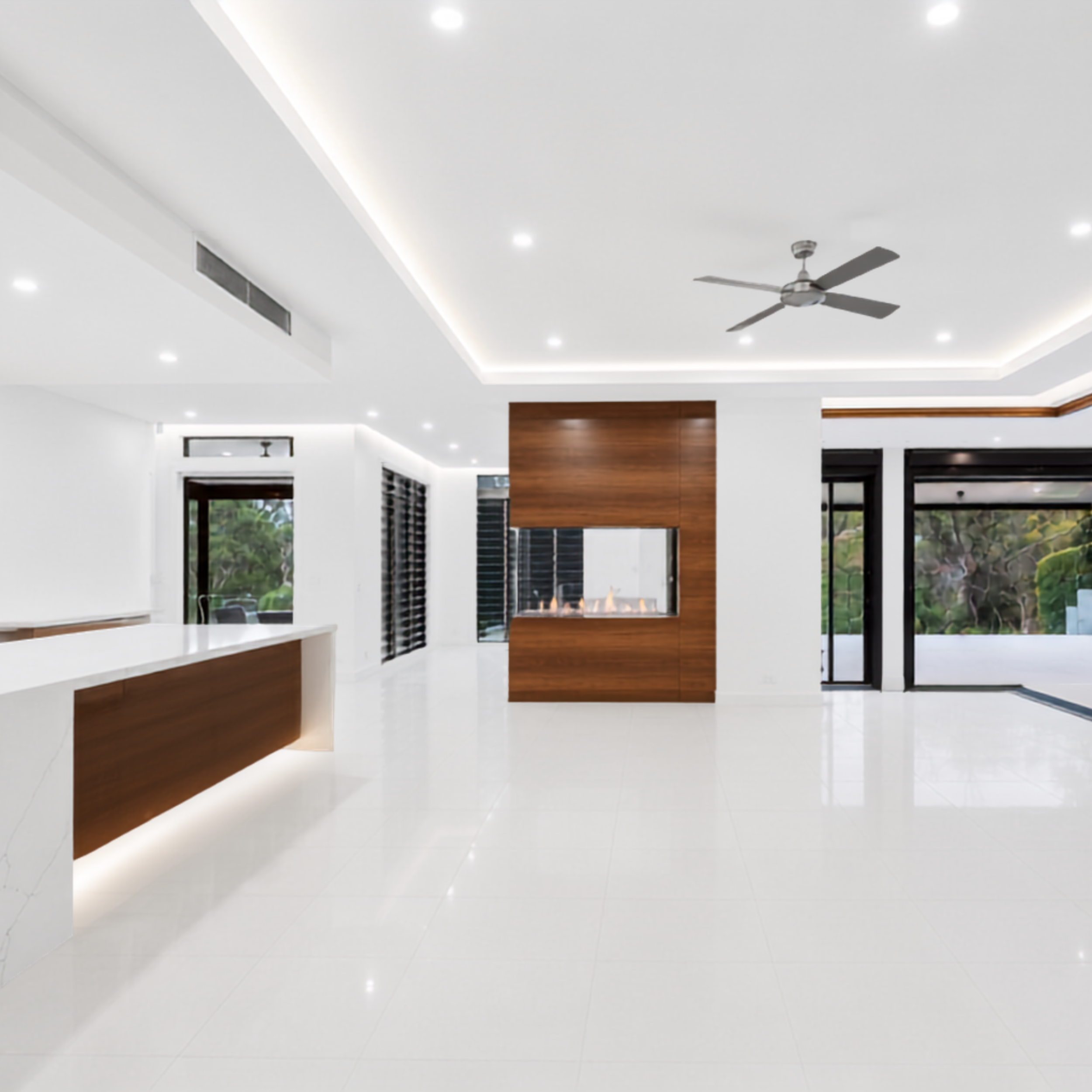 Freshly painted modern living room with white ceiling and walls