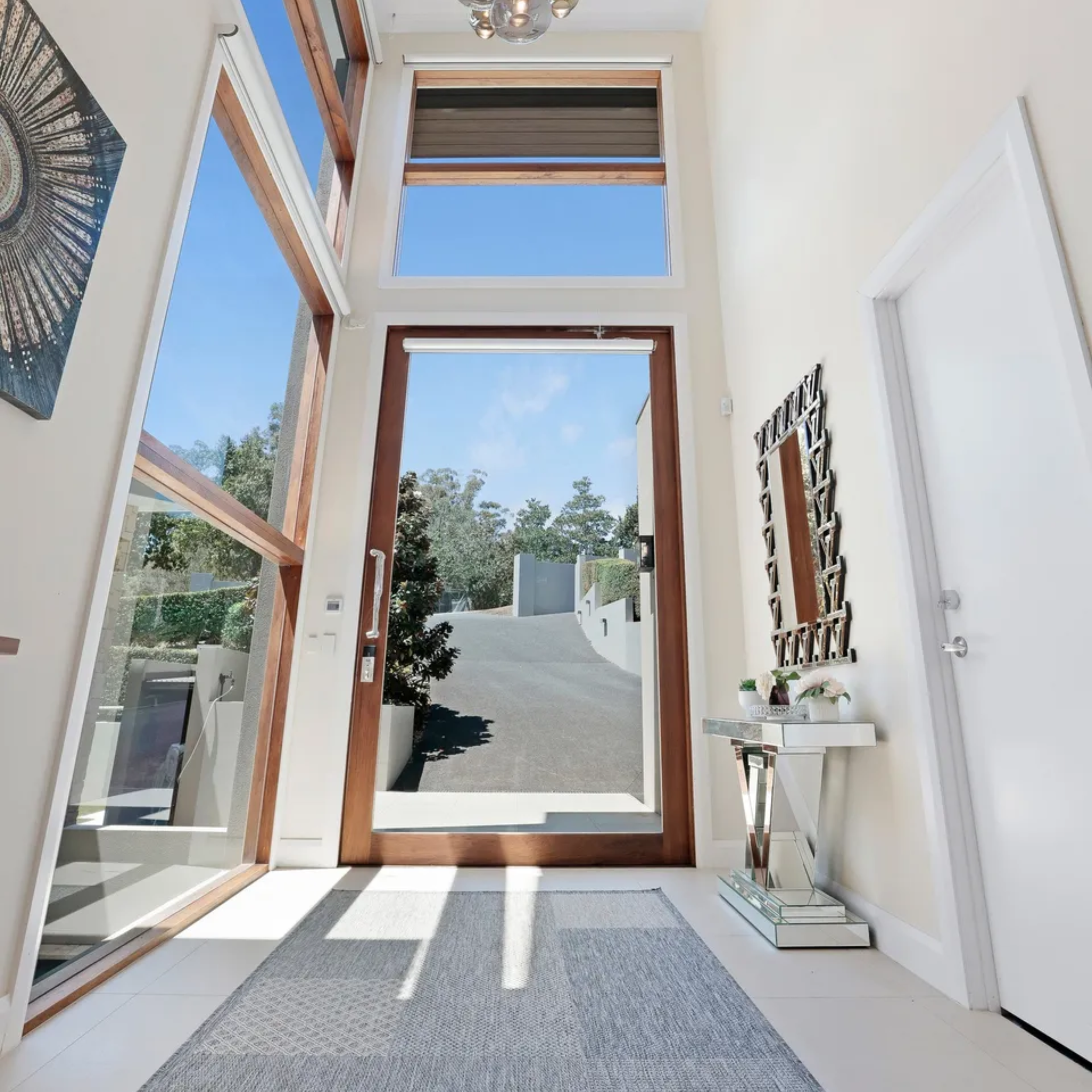 Residential hallway before repainting cream walls white