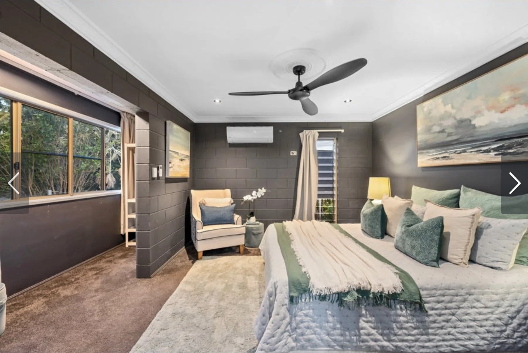 Finished bedroom repaint with dark feature walls by CAC Coatings