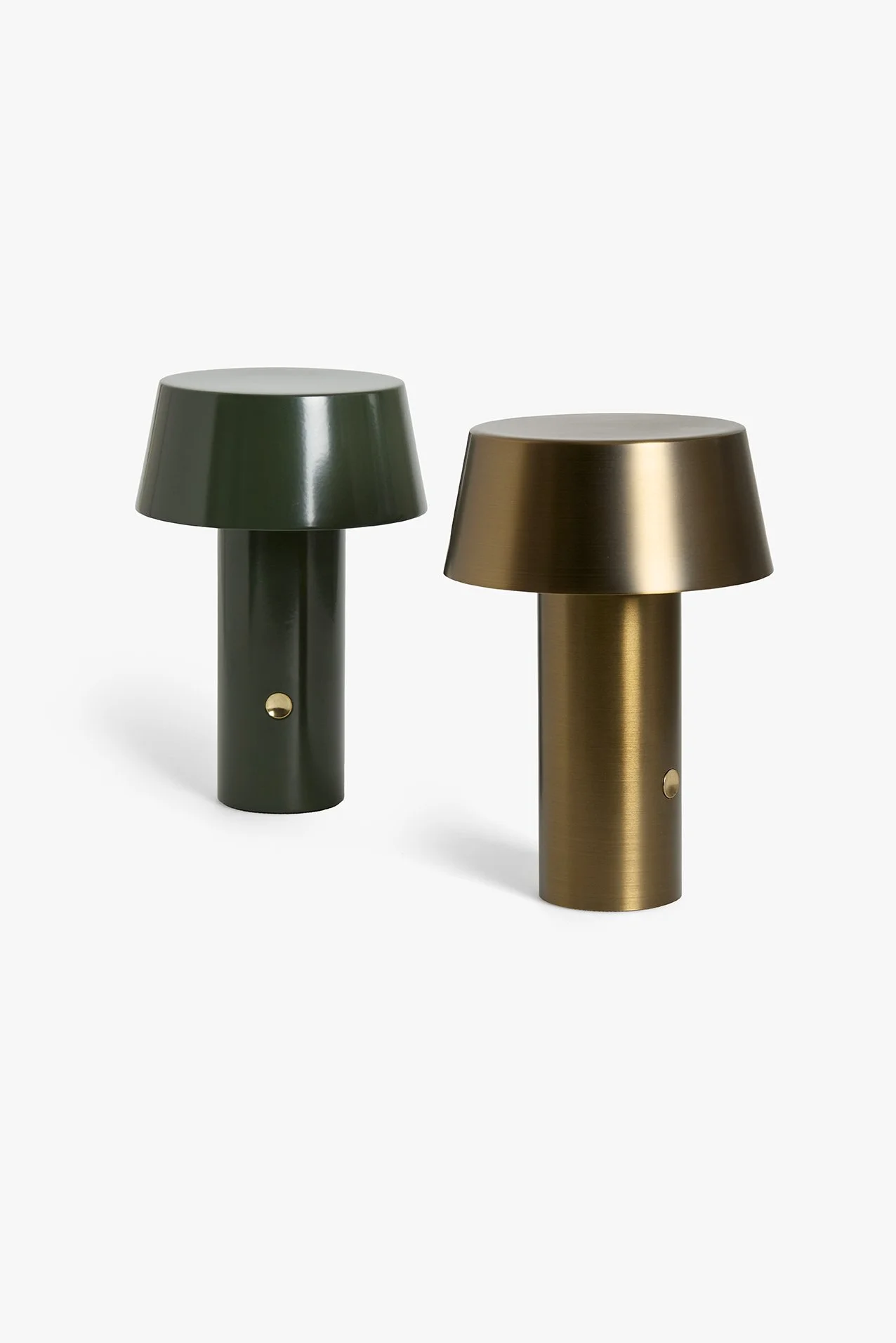 Two modern, portable table lamps with cylindrical bases by LIK Lighting, one in olive green and the other in metallic gold, set against a plain white background.