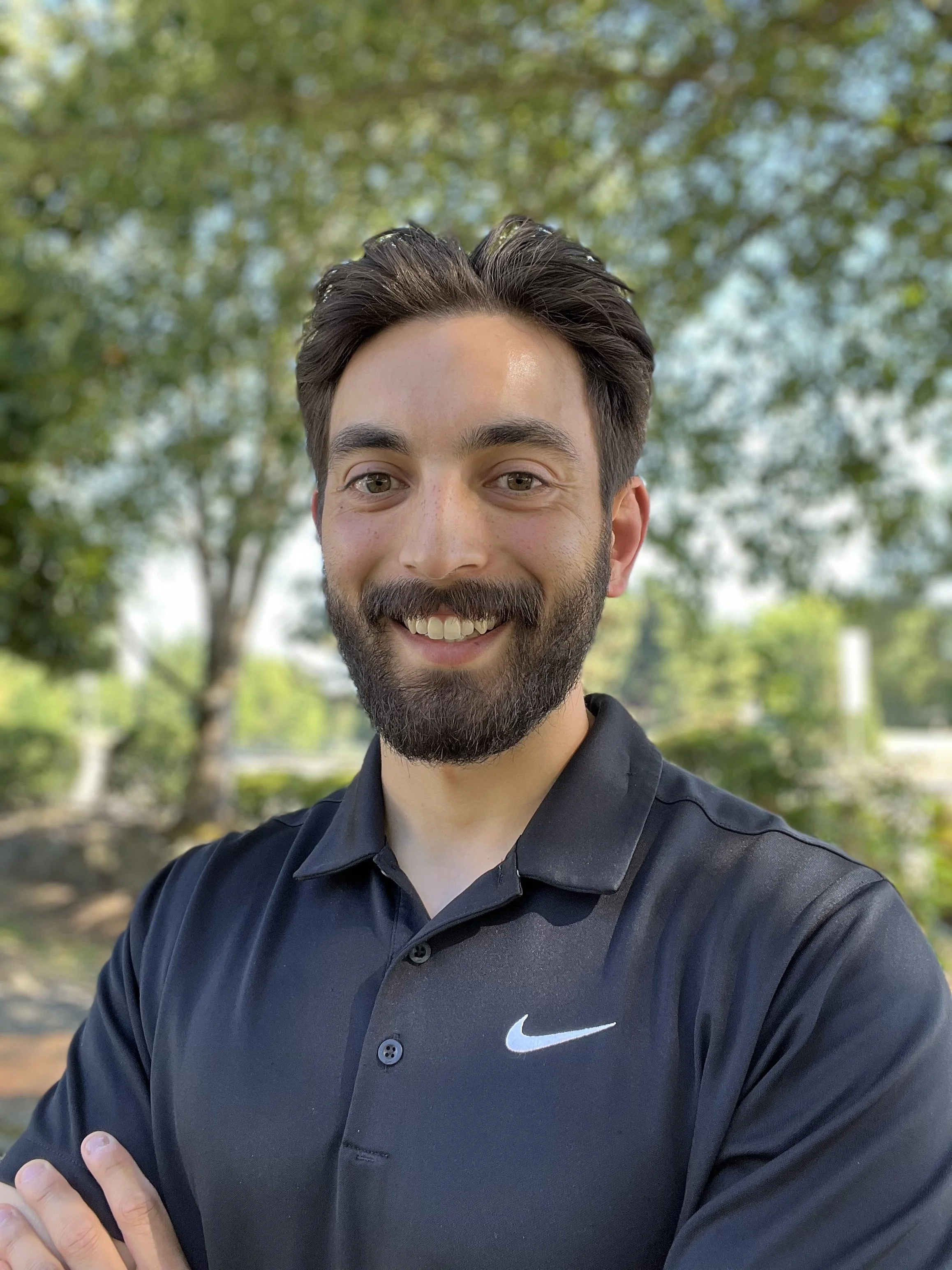 Dr. CJ Schuster DC CSCS sports chiropractic office Kirkland Eastside photo
