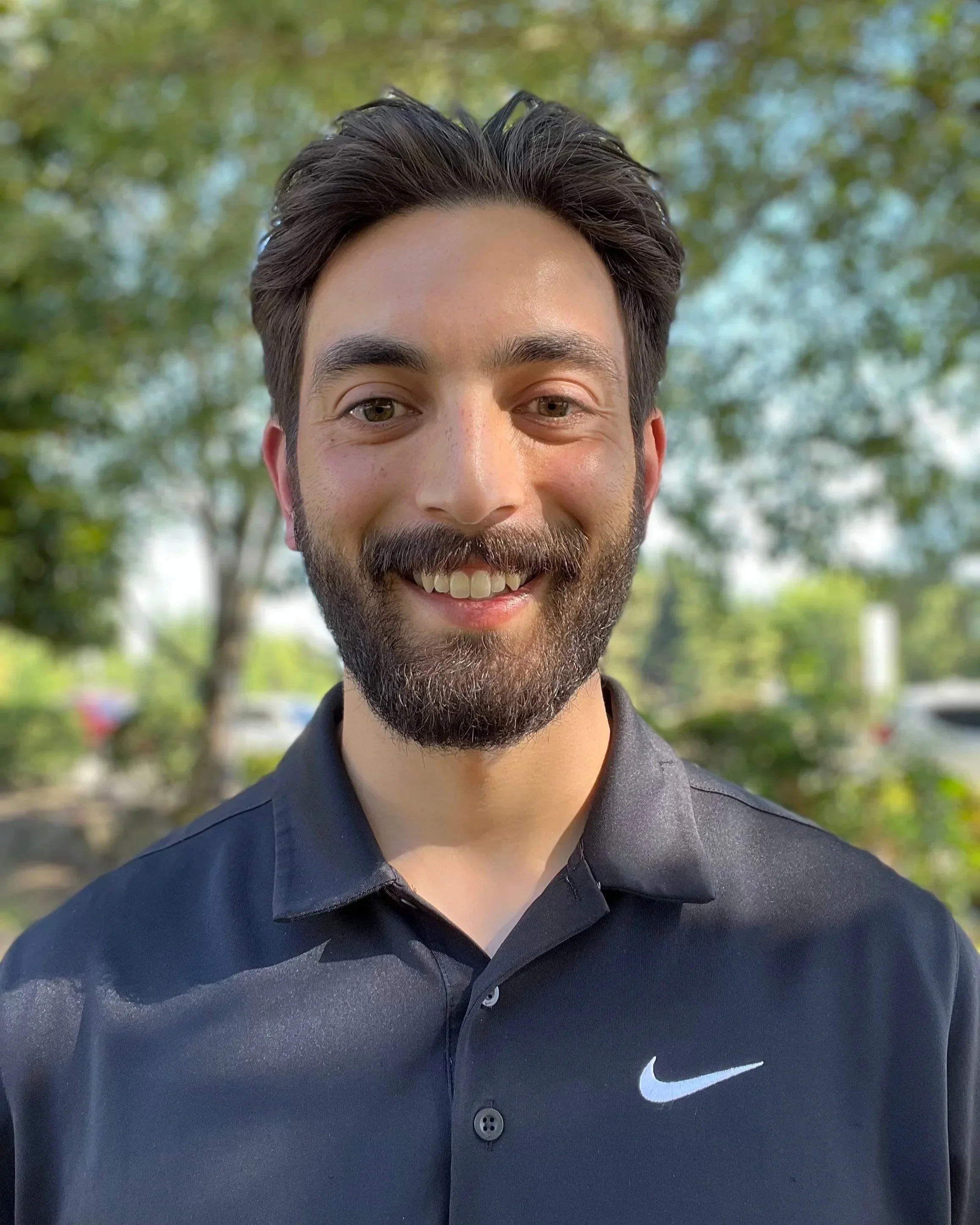 Dr. CJ Schuster DC CSCS sports chiropractic office Kirkland Eastside photo