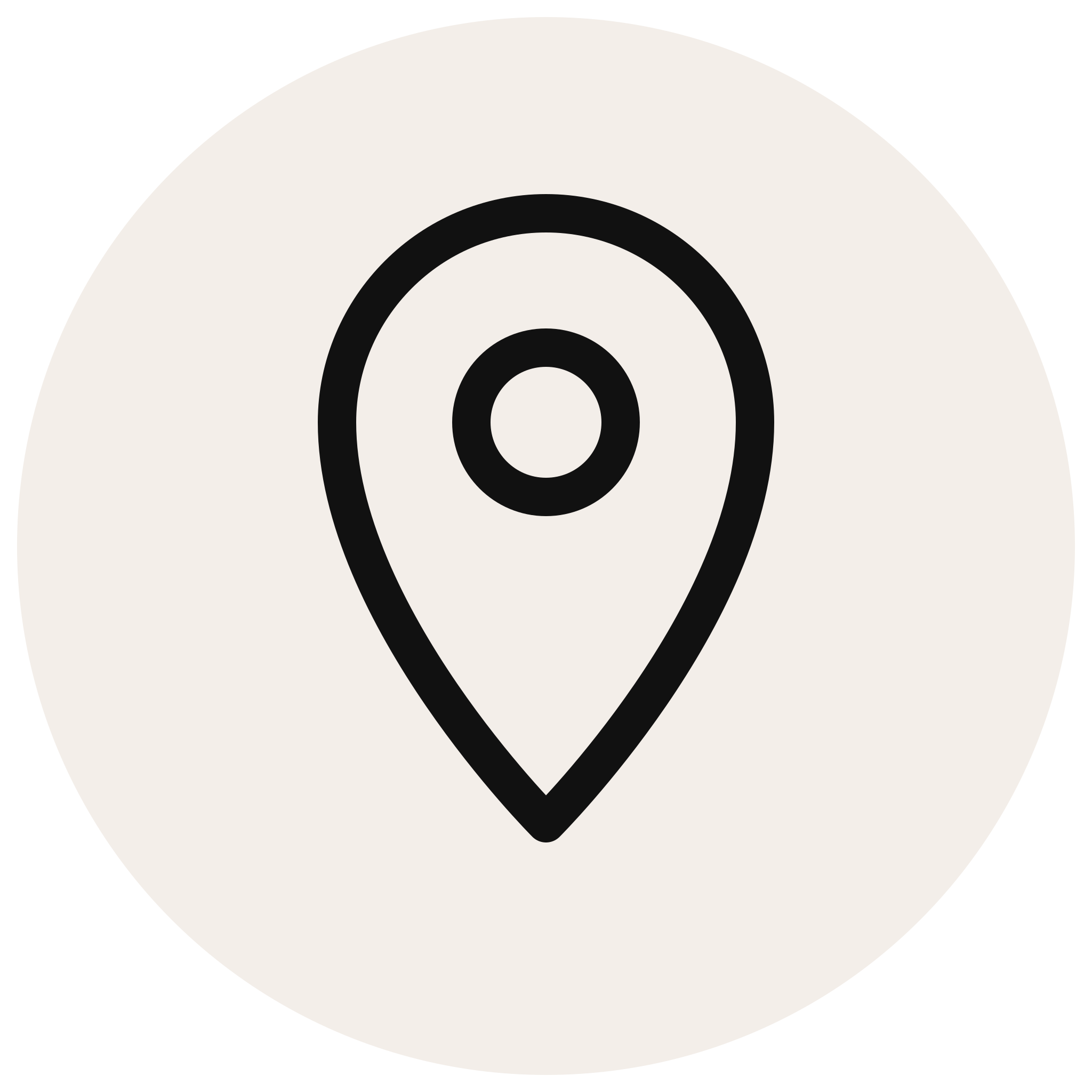 Close-up of a target with concentric circles in black and white, typically used for archery or shooting practice.