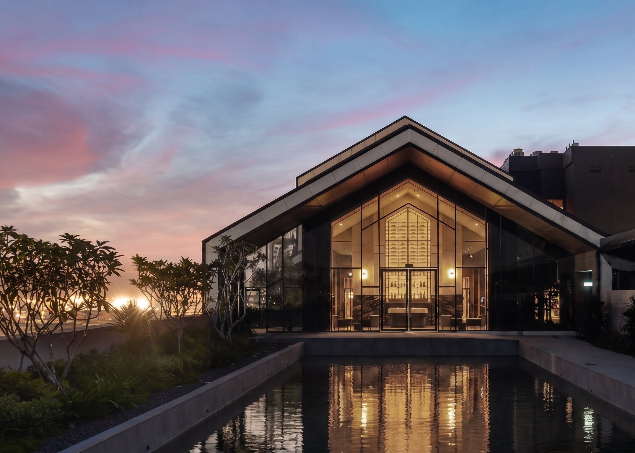 Pavilion-style entrance with full-height glazing and reflecting pool, luxury workspace, Singapore, interior design by Rockett Studio