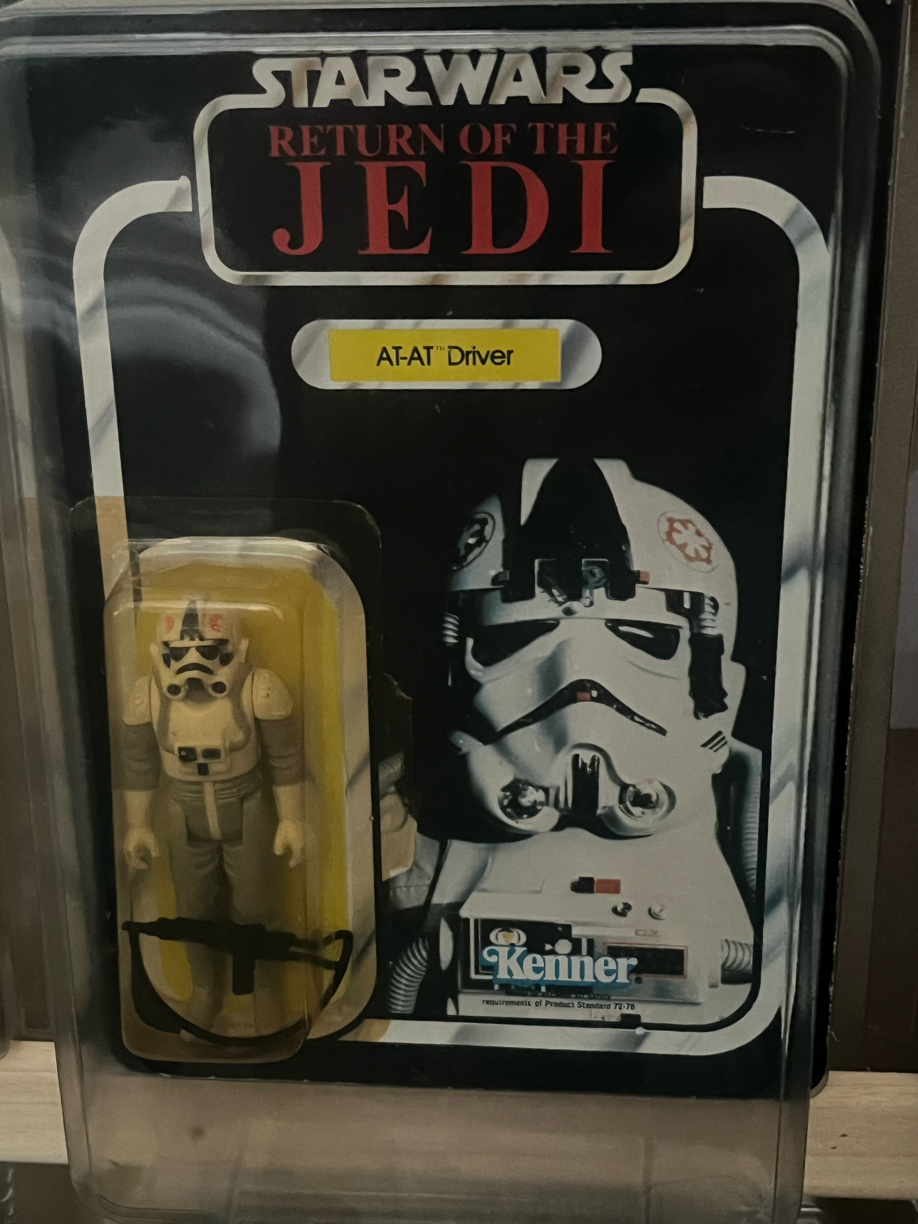 A vending machine with a sticker that reads 'TRUST YOURSELF' and an illustration of a stormtrooper from Star Wars.