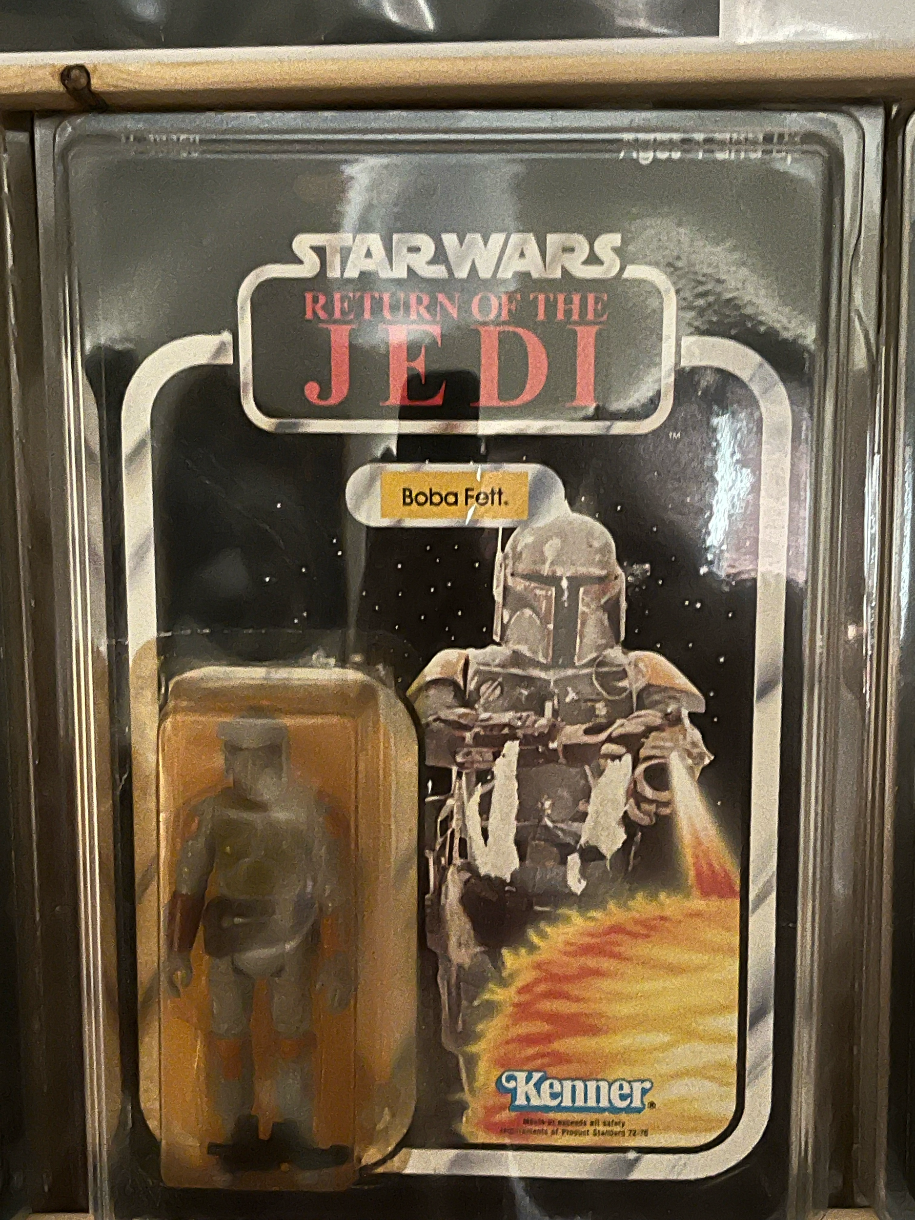 A sealed package of Star Wars The Empire Strikes Back action figures from Burger King. The package contains a Boba Fett figure and is labeled 'Star Wars The Empire Strikes Back' with a background of space and a starship.